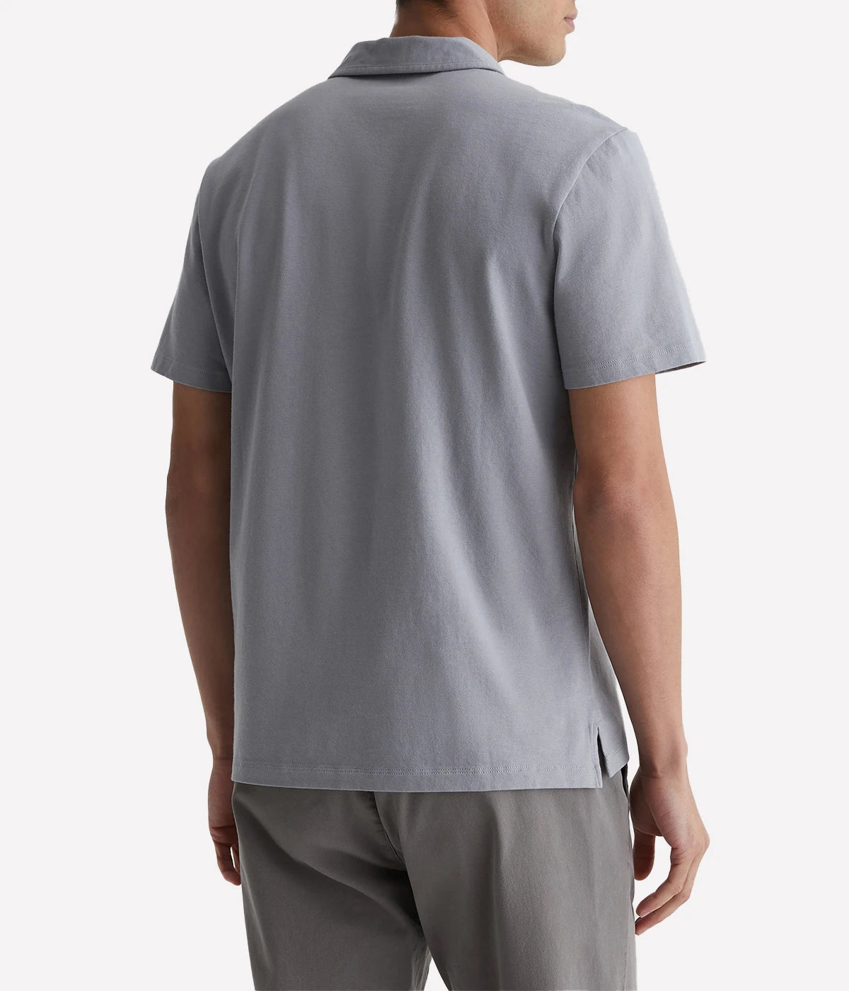 Rear view of the Bryce Johnny Collar polo shirt, highlighting its streamlined silhouette and soft cotton fabric.