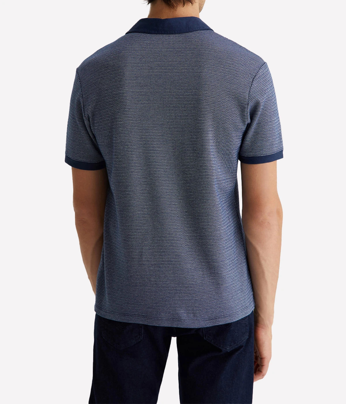 Rear view of the Bryce Johnny Collar polo shirt, highlighting its streamlined silhouette and soft cotton fabric.