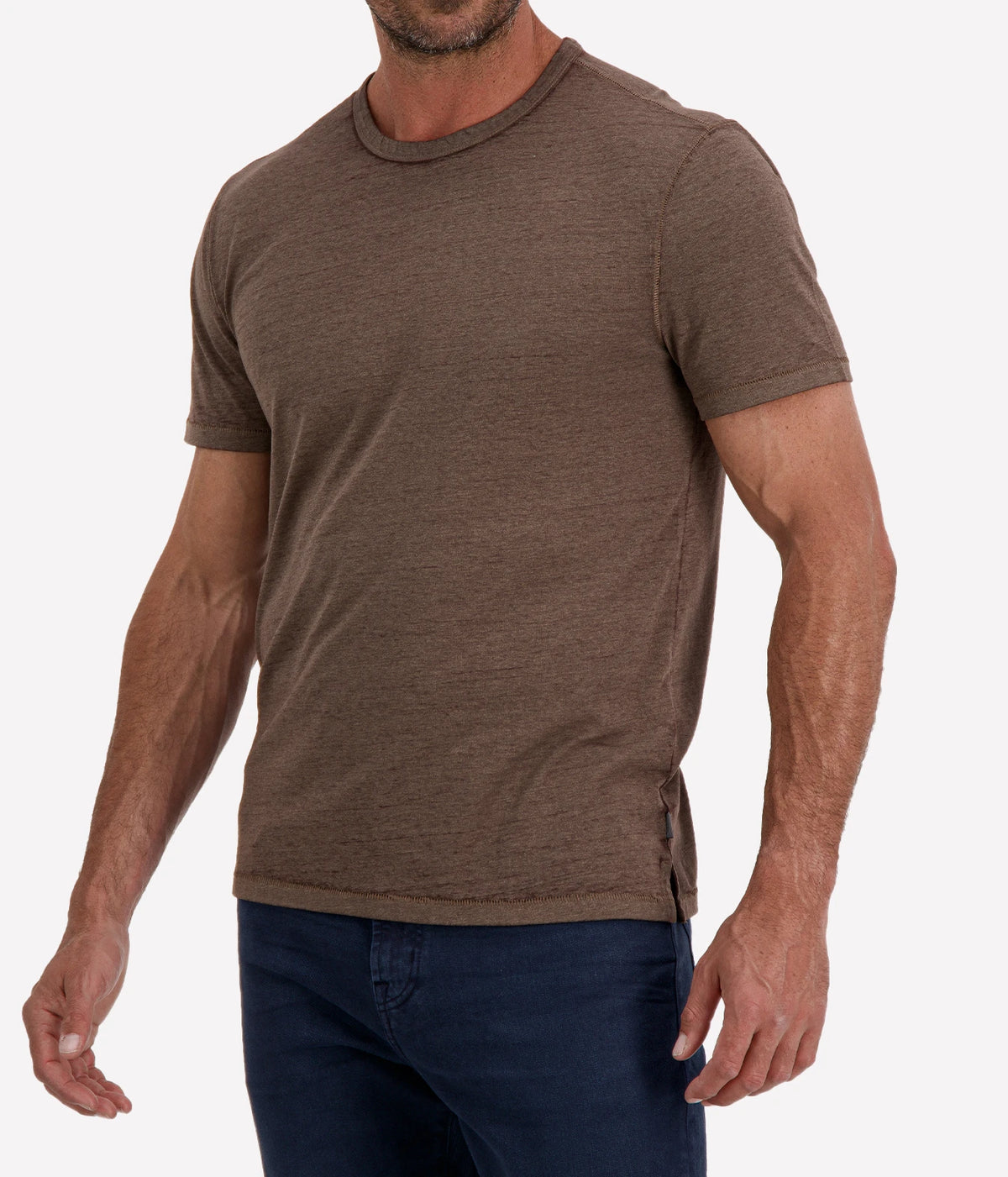 Man wearing John Varvatos Bale Burnout Crewneck Tee in Teakwood with indigo jeans, cropped angled front view