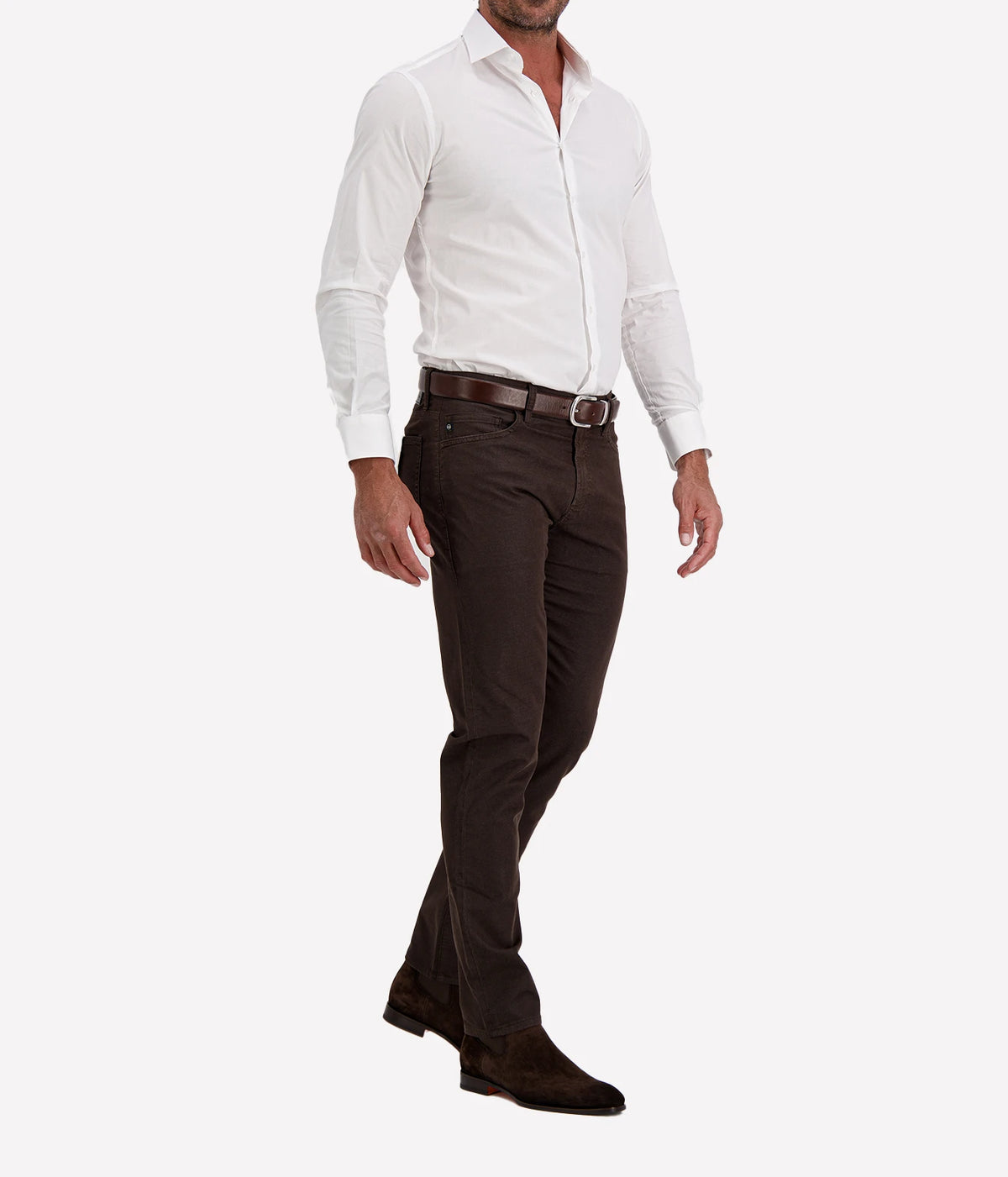 Man wearing Ingram Slim Fit Shirt in White with dark brown trousers and dark brown shoes, angled front view