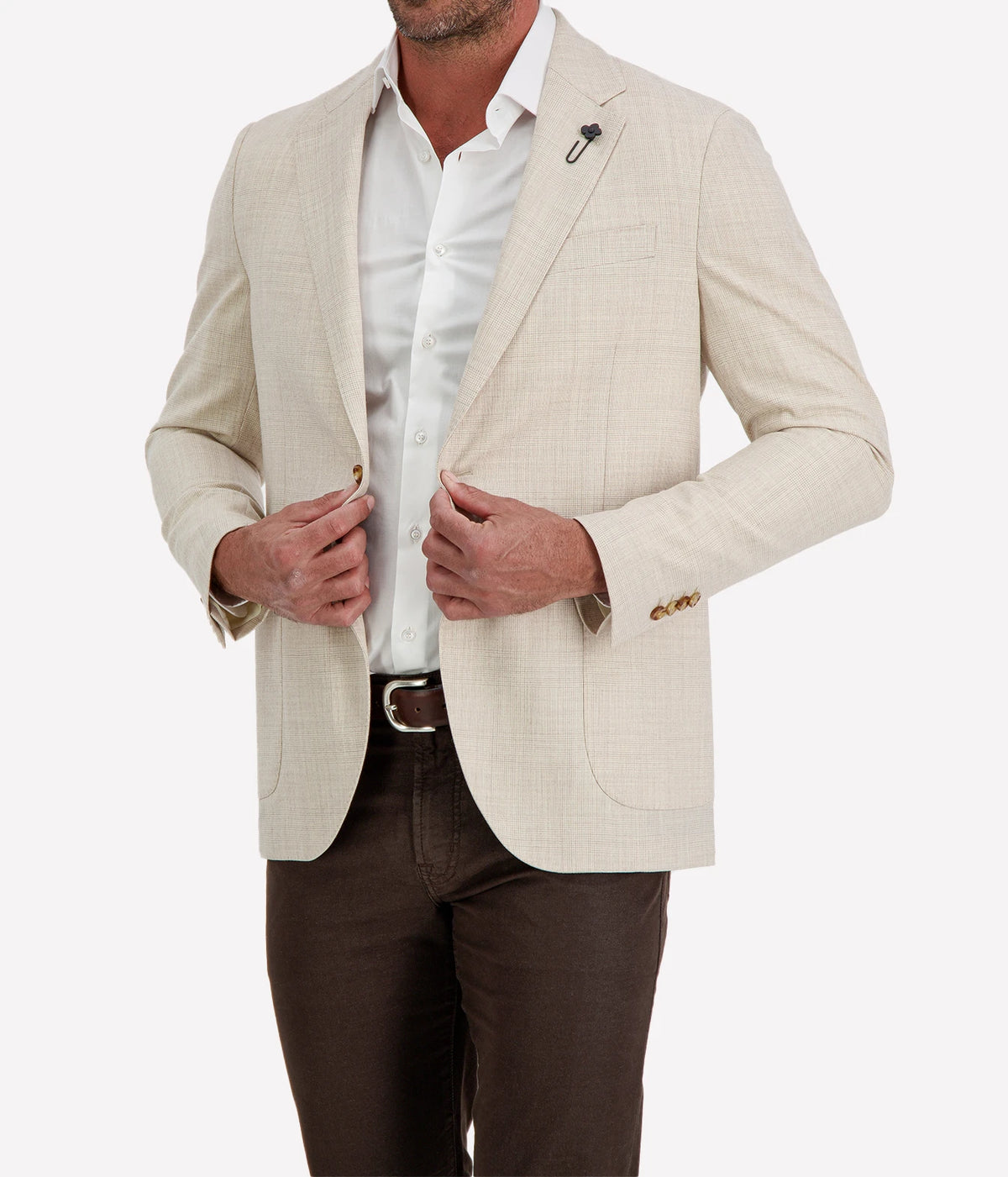 Man wearing Lardini Iconic Jacket in Beige Check with a white shirt, front close-up showing the flower lapel pin