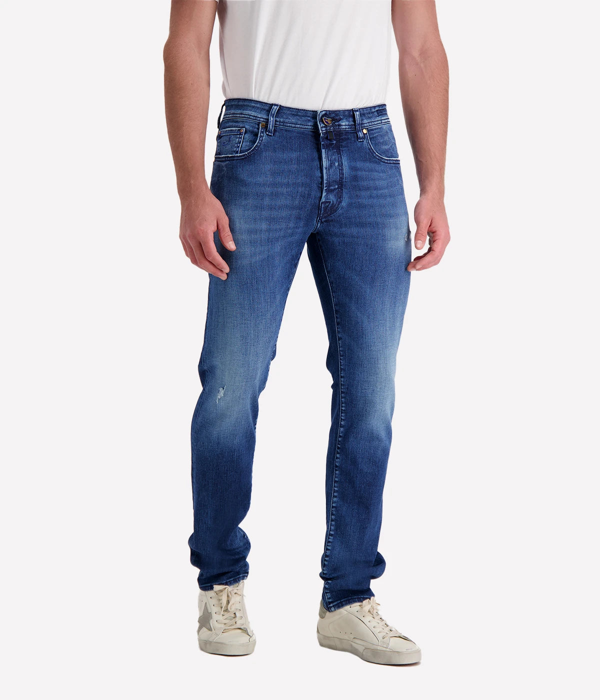 Jacob Cohen's Bard 5-Pocket Jean in a mid-blue wash. Showcasing a mid-rise, slim fit with branded hardware and suede patch detail. A versatile, luxurious jean for both casual and formal occasions.