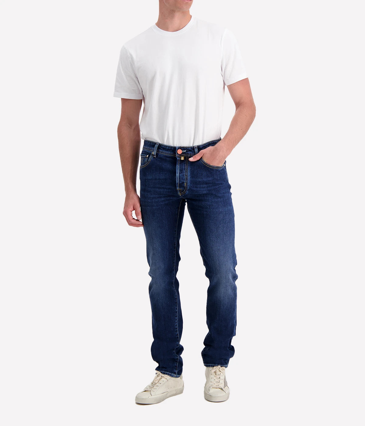 Bard 5-Pocket Jean by Jacob Cohen in a blue wash. Designed with a mid-rise, slim fit, and crafted from premium stretch denim, featuring signature branded hardware and a suede patch detail. A versatile, stylish jean suitable for both casual and formal looks.