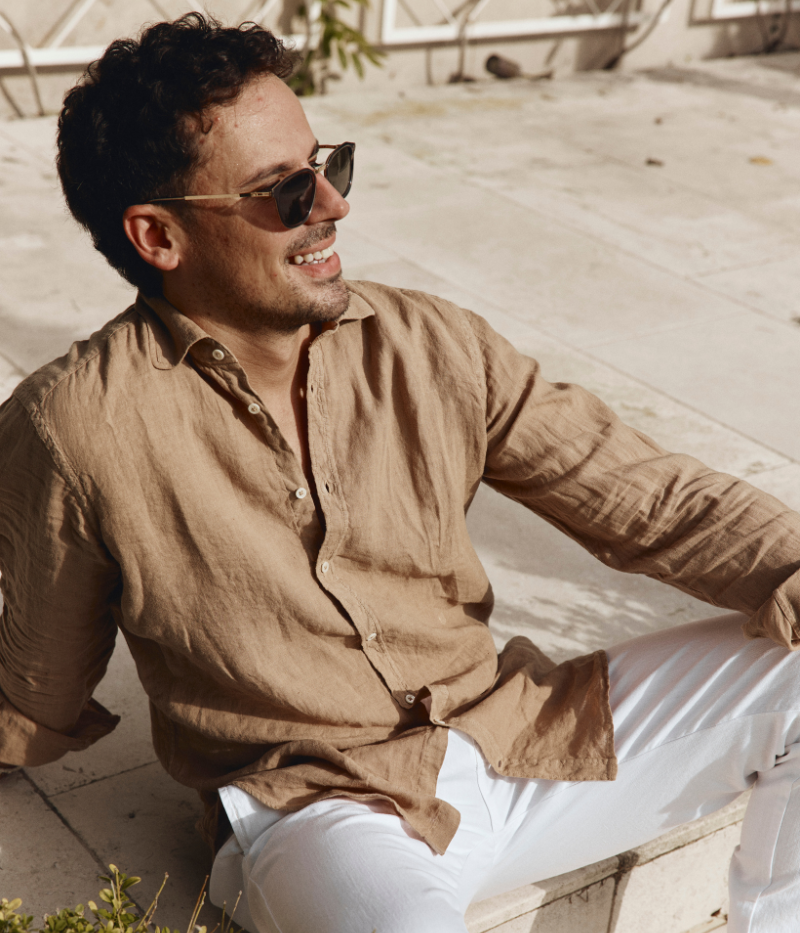 Lightweight linen shirt with a soft collar, embroidered detailing, and a refined fit.