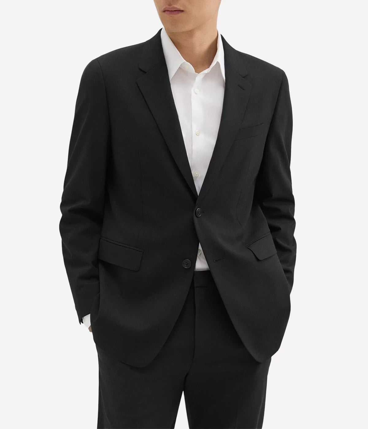 Chambers Blazer by Theory, crafted from luxurious Italian virgin wool and Lycra Spandex. Features a structured fit, classic notch lapels, chest and flap pockets, and buttoned cuffs. Fully lined, wrinkle-resistant, and moisture-controlling fabric, perfect for both professional and casual wear