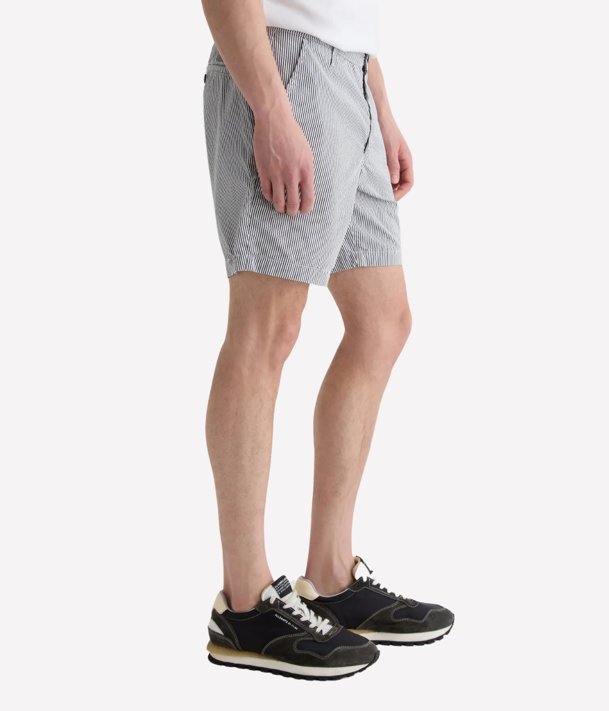 AG Cipher Short in Charcoal Stripe made from stretch seersucker, featuring a mid-rise waist, slim fit, and refined striped finish.