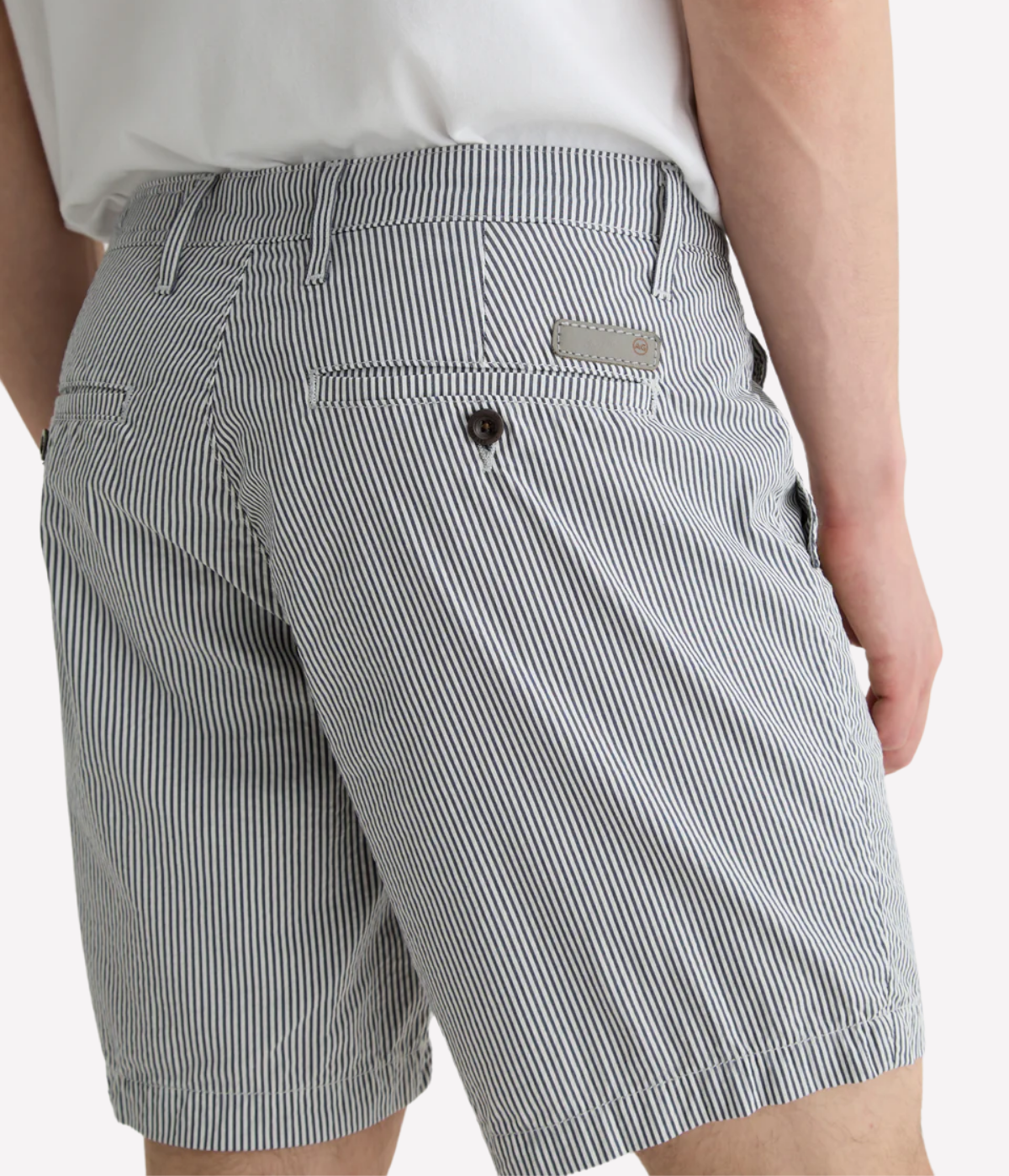 AG Cipher Short in Charcoal Stripe made from stretch seersucker, featuring a mid-rise waist, slim fit, and refined striped finish.