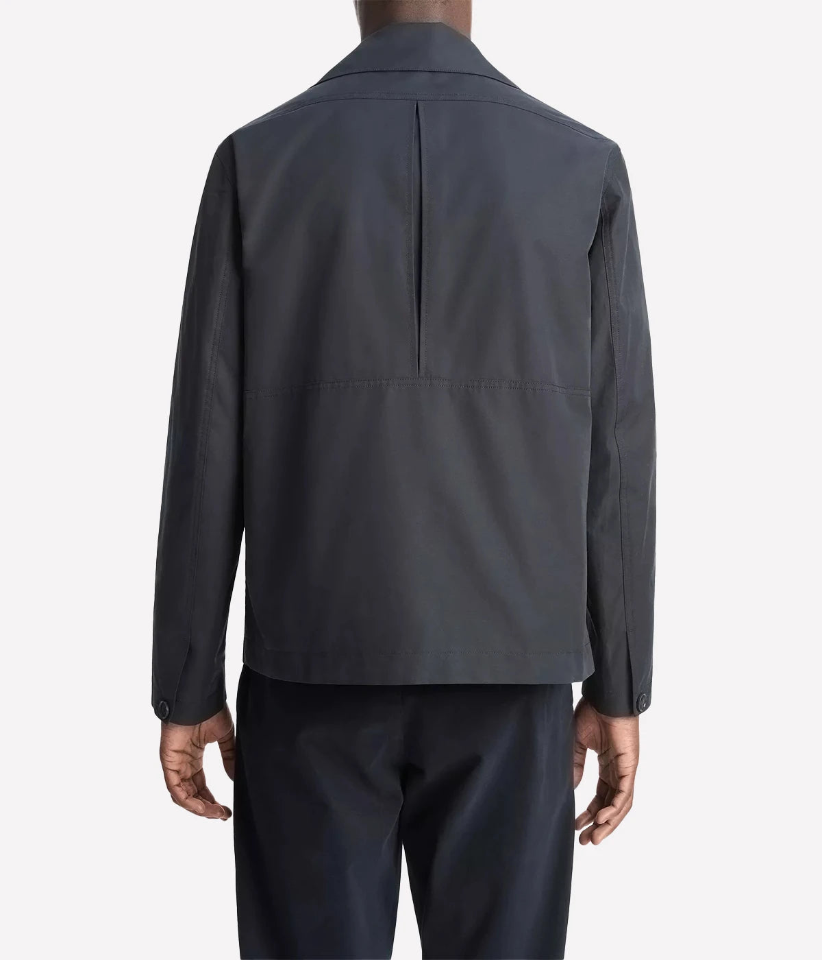 Vince men’s lightweight cotton-blend jacket in a soft peached finish with convertible collar, zip and snap front, and gusseted back for movement.
