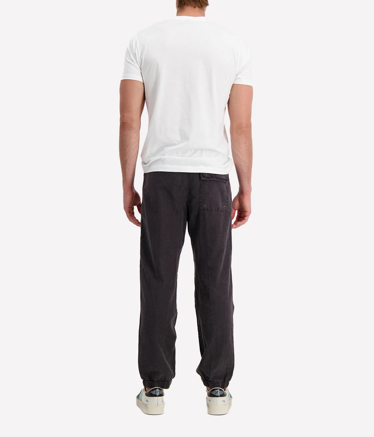 Textured cotton hemp flight pants in a relaxed fit, featuring a button fly, cuffed leg opening, knee tuck details, and snap button flap pockets. Crafted from breathable Italian cotton hemp with a unique textured finish.