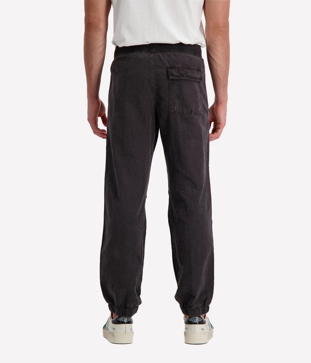 Textured cotton hemp flight pants in a relaxed fit, featuring a button fly, cuffed leg opening, knee tuck details, and snap button flap pockets. Crafted from breathable Italian cotton hemp with a unique textured finish.