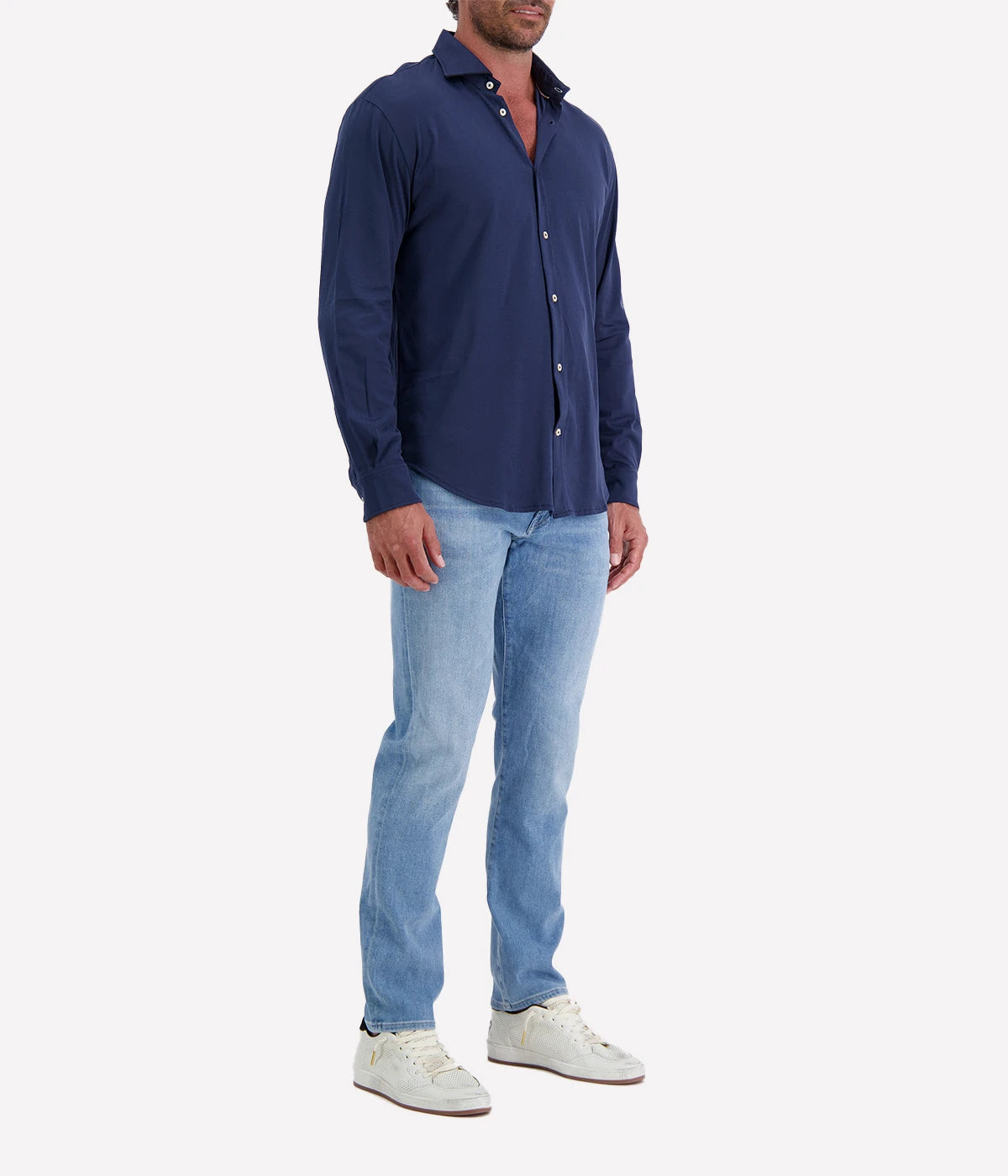 Refined Dandy Shirt in soft jersey cotton with cutaway collar, front button fastening, and long sleeves with buttoned cuffs. Perfect for smart-casual styling.