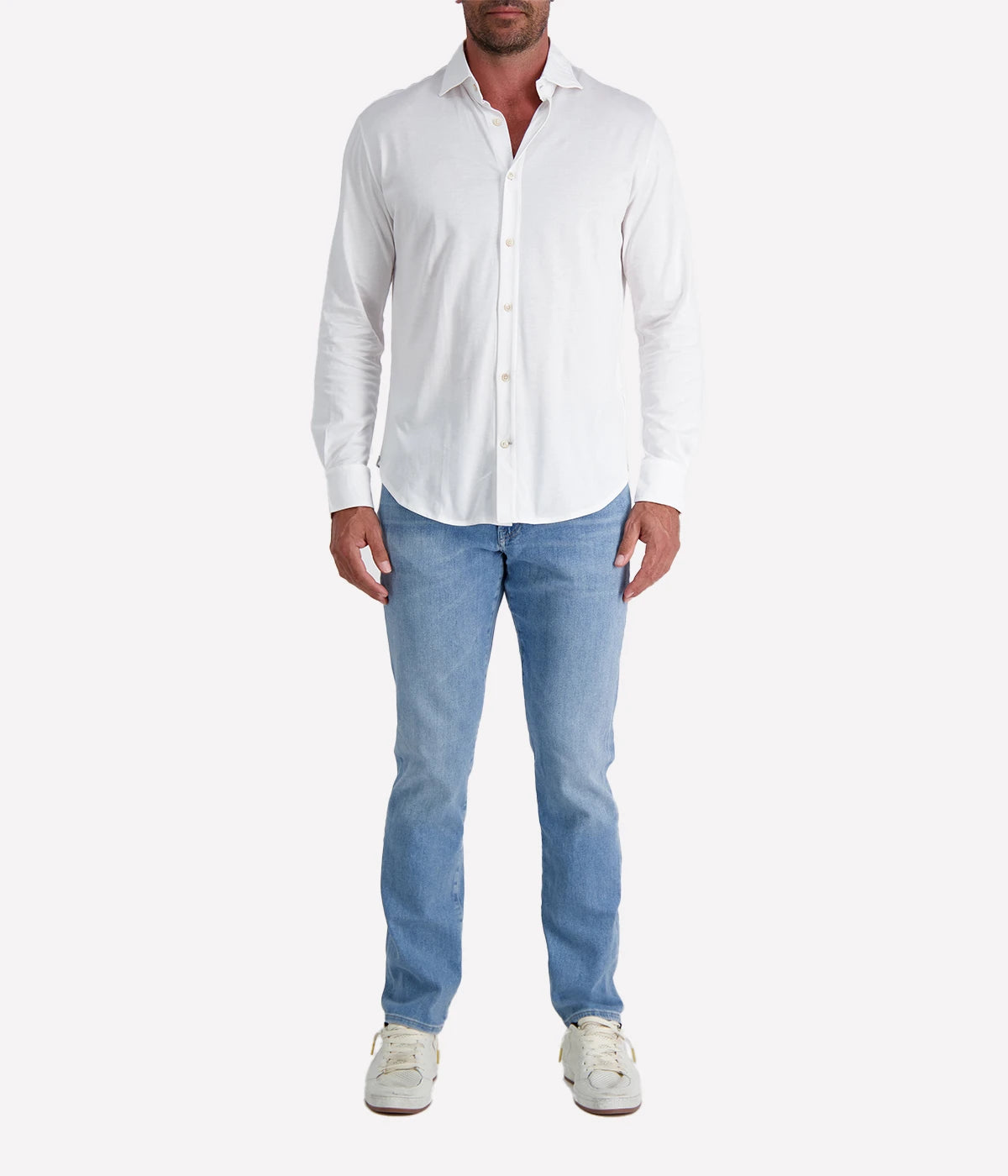 Refined Dandy Shirt in soft jersey cotton with cutaway collar, front button fastening, and long sleeves with buttoned cuffs. Perfect for smart-casual styling.