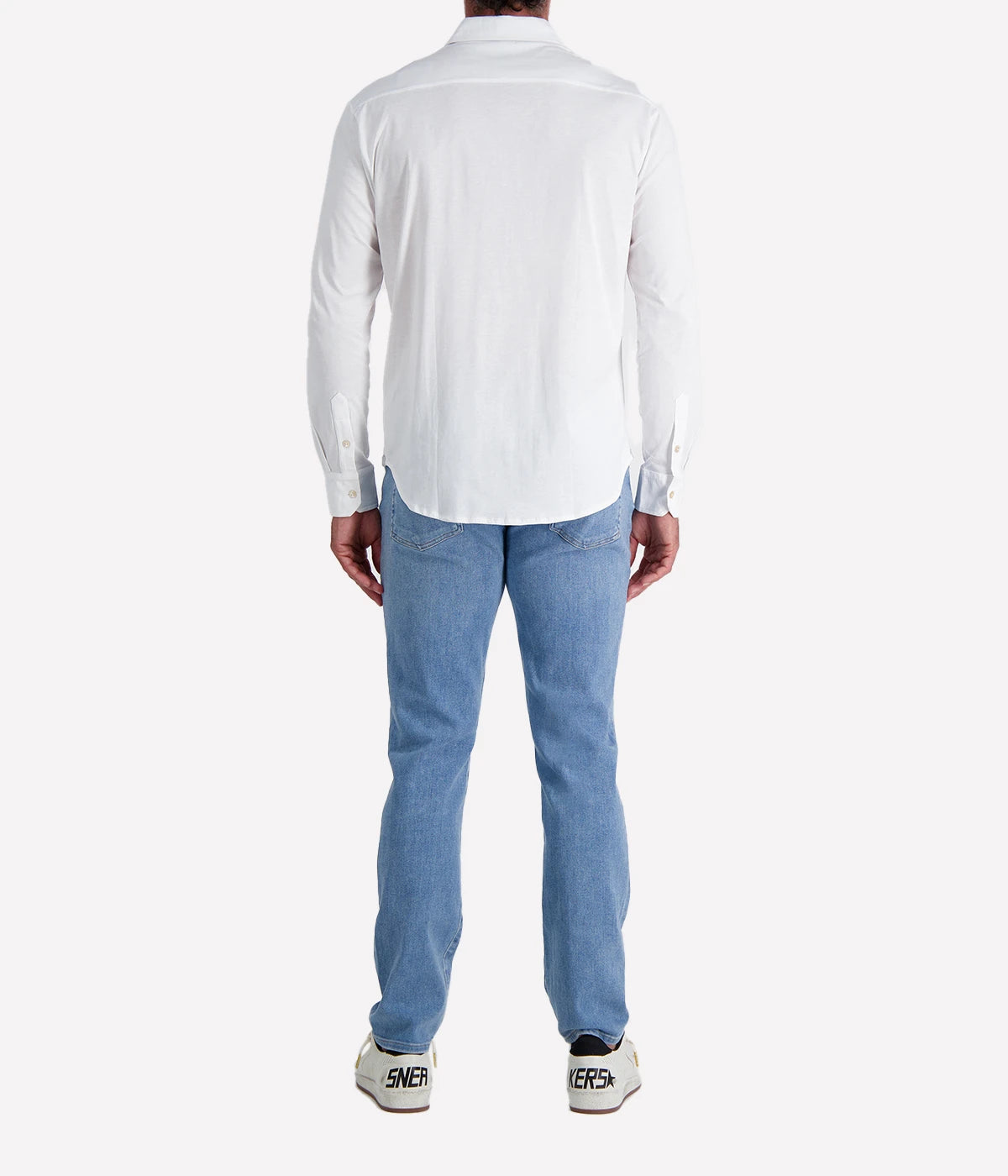 Refined Dandy Shirt in soft jersey cotton with cutaway collar, front button fastening, and long sleeves with buttoned cuffs. Perfect for smart-casual styling.