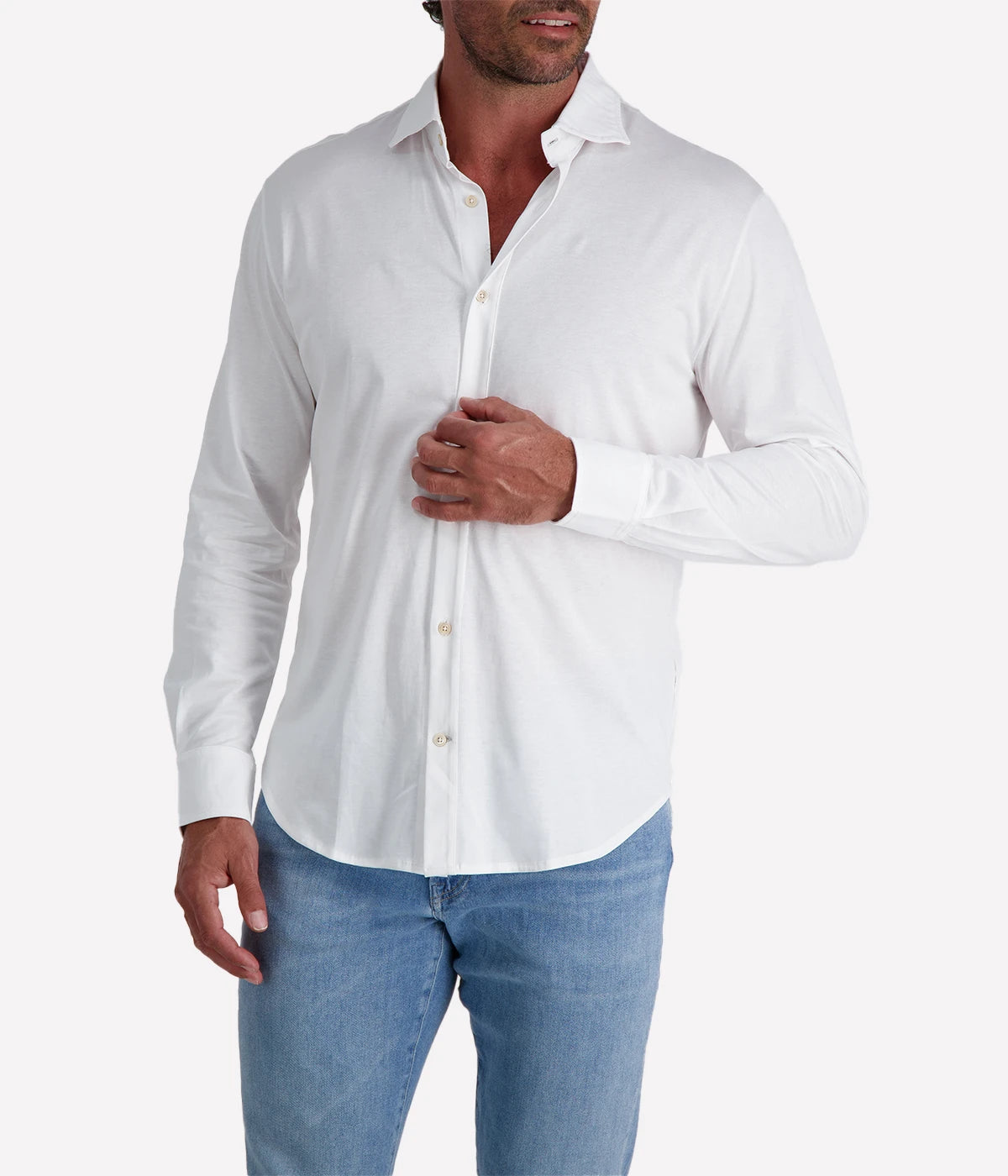 Refined Dandy Shirt in soft jersey cotton with cutaway collar, front button fastening, and long sleeves with buttoned cuffs. Perfect for smart-casual styling.