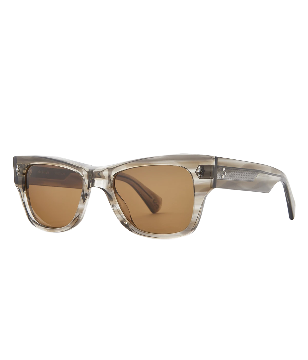 The Duke sunglasses feature bold, thick acetate with Shark Teeth filigree and Fish Hook metal accents. Made with premium materials, including Mr. Leight Select Glass lenses and nickel silver core wire. Handcrafted in Japan, these sunglasses offer 100% UV protection in a modern, classic style.