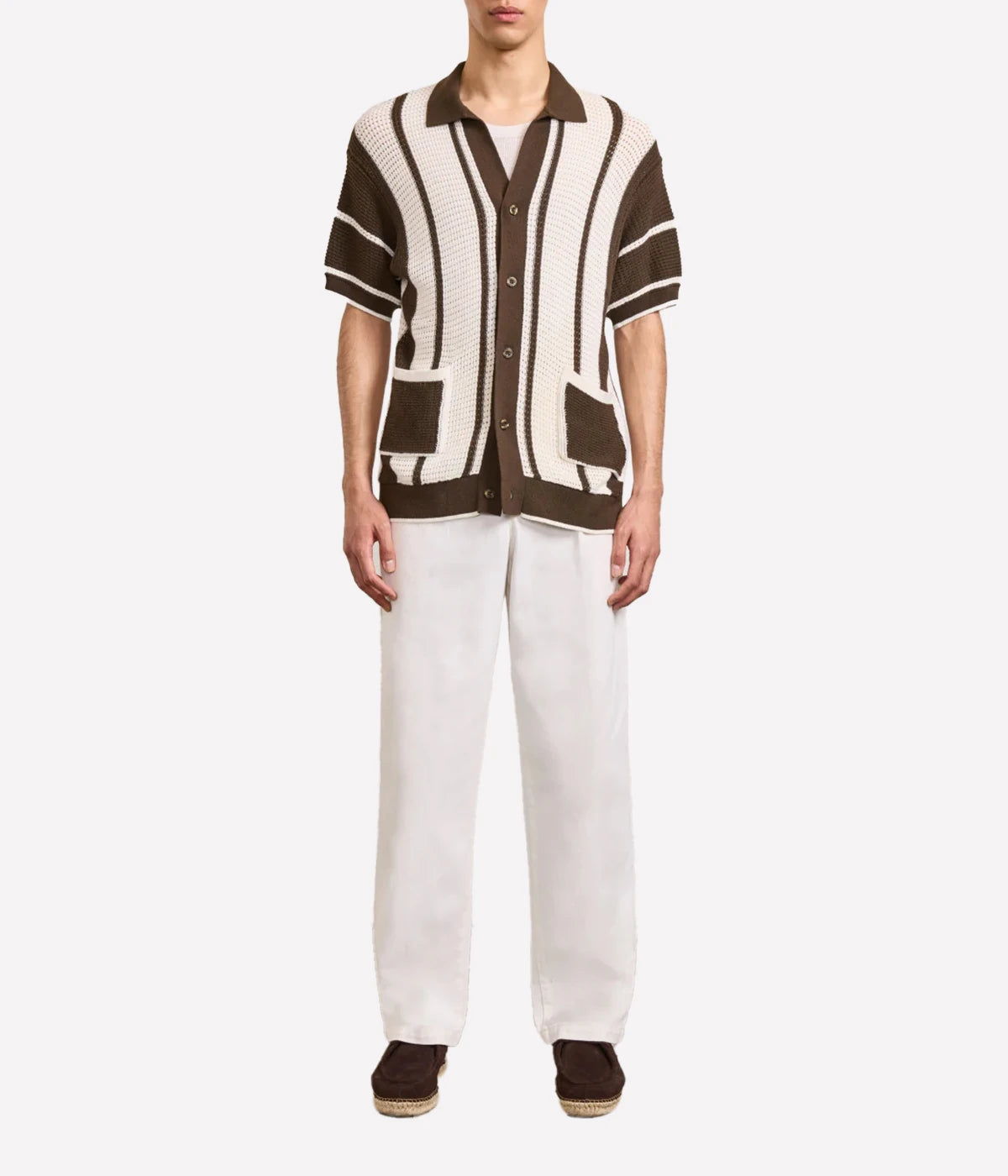 Fabricio Cardigan in 100% cotton with a pointelle knit and striped design. Featuring a relaxed fit, open collar, button-up front with branded mother-of-pearl buttons, front patch pockets, and ribbed hem and cuffs.