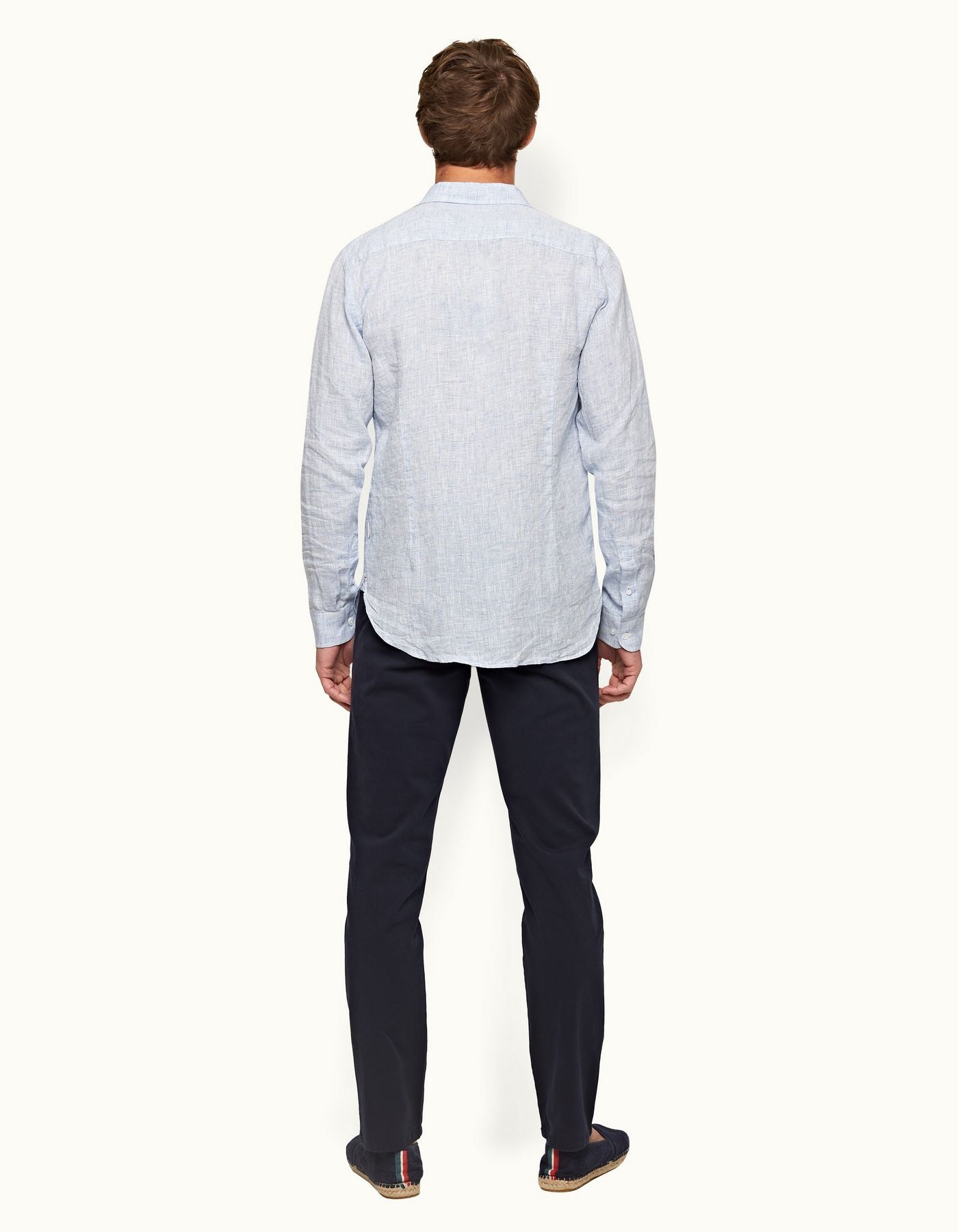 Fallon Dark Navy trousers with tailored fit, adjustable side fasteners, and multiple pockets. Made from stretch-cotton twill for comfort and versatility, perfect for both casual and dressy looks.