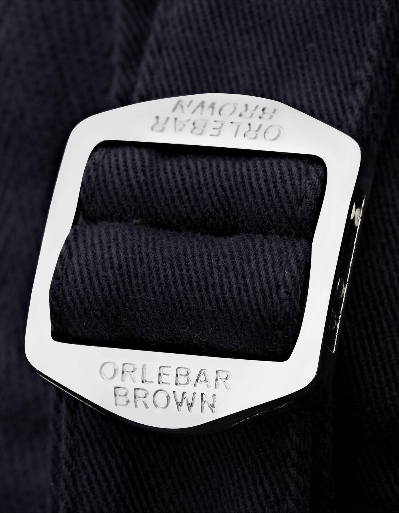 Fallon Dark Navy trousers with tailored fit, adjustable side fasteners, and multiple pockets. Made from stretch-cotton twill for comfort and versatility, perfect for both casual and dressy looks.