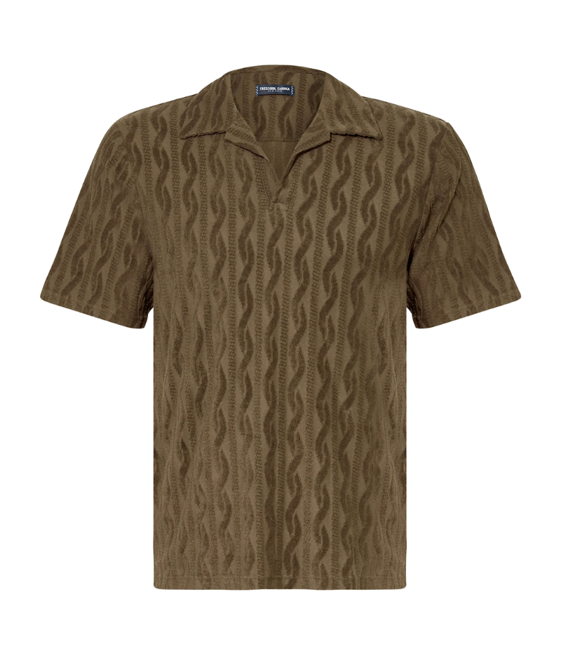 Men's Faustino Polo in organic Terry cotton with jacquard pattern, featuring an open camp collar, relaxed fit, and side slits.