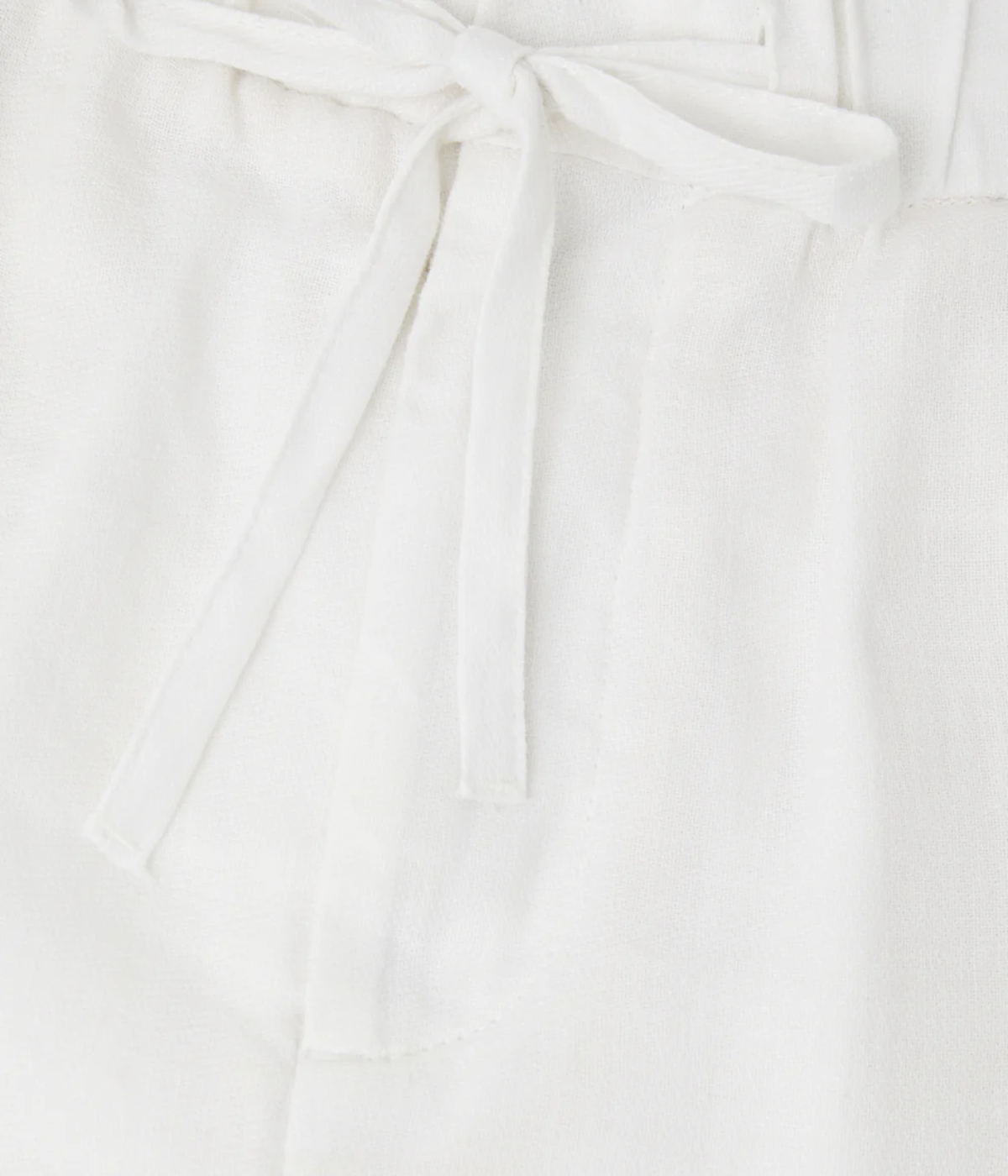 Close-up of a white linen fabric texture