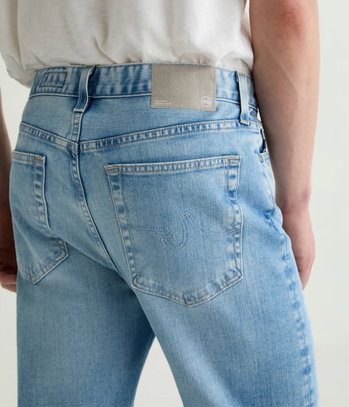 AG Felix Jean in Lobera light wash, featuring a vintage straight leg, button fly, and eco-friendly Vapor Wash™ finish on Japanese stretch denim.
