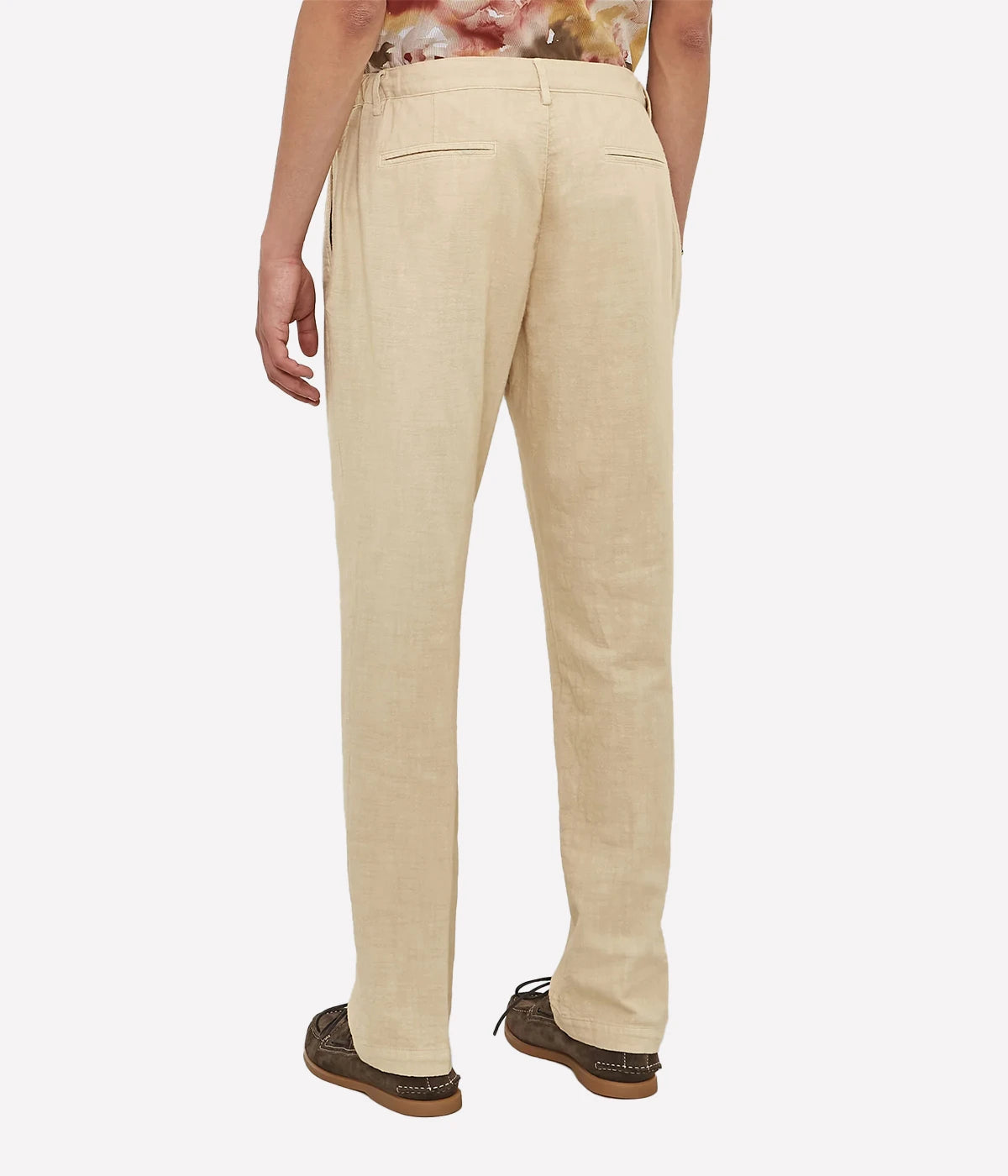 Men's comfort-fit cotton gauze trousers with pleats, elastic waistband, and slant pockets.