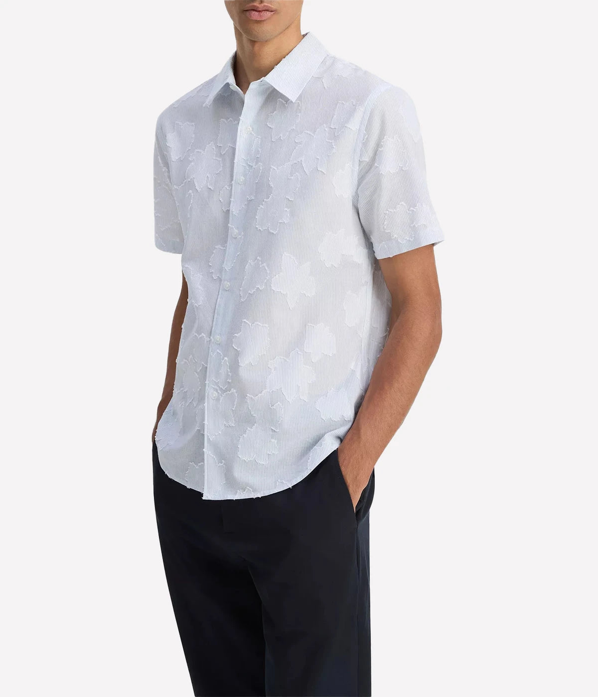Vince men’s button-up shirt with fil coupé floral pattern layered on striped cotton, featuring a shirttail hem and pleated back.