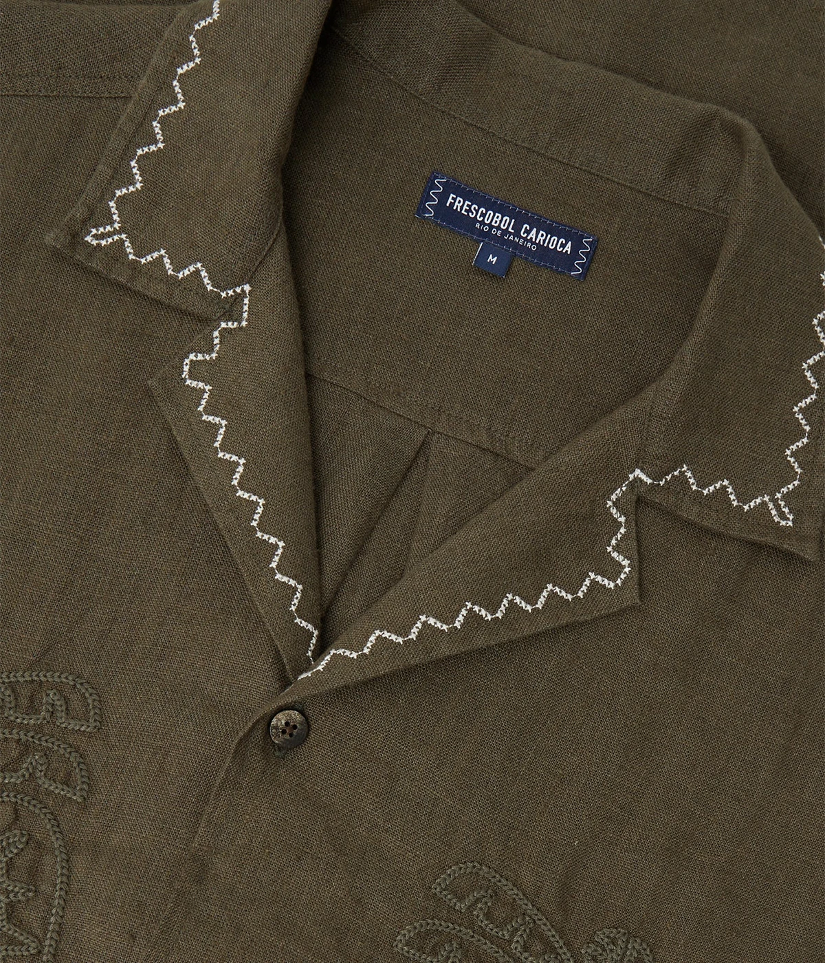 Flavio Linen Shirt with Palmeira embroidery, Copacabana-inspired stitching, and tonal frontal embroidery. Relaxed fit with camp collar and imitation stone buttons.