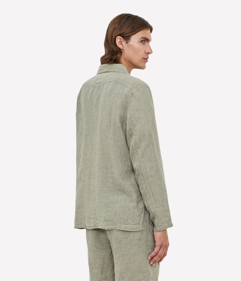 Striped linen shirt jacket with a single-breasted design, small lapels, and three patch pockets, made in Italy.