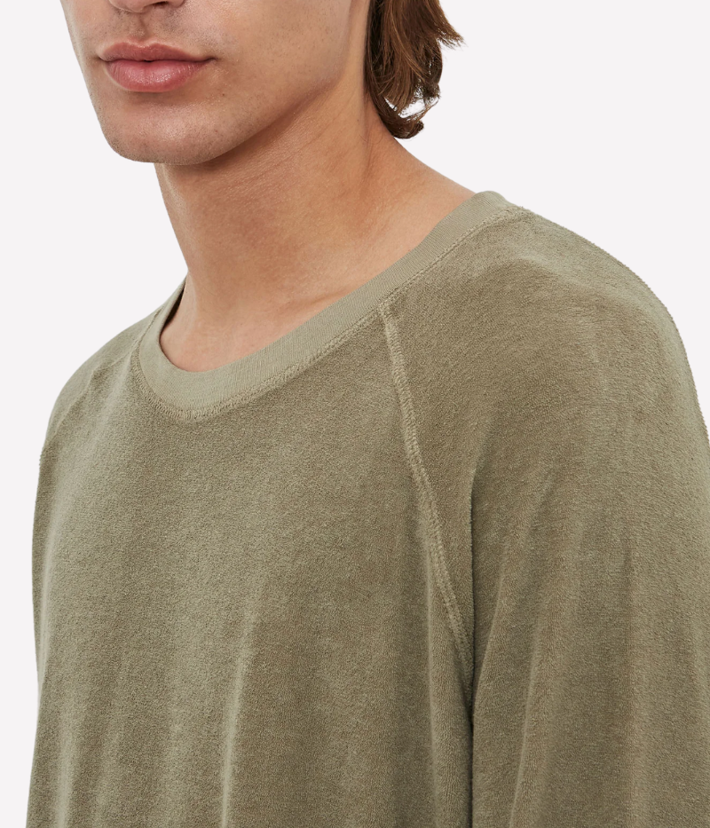 Loose-fit crew-neck sweatshirt in fleece terry cotton-linen jersey, featuring a relaxed silhouette and classic design. Made in Italy with soft, breathable fabric.