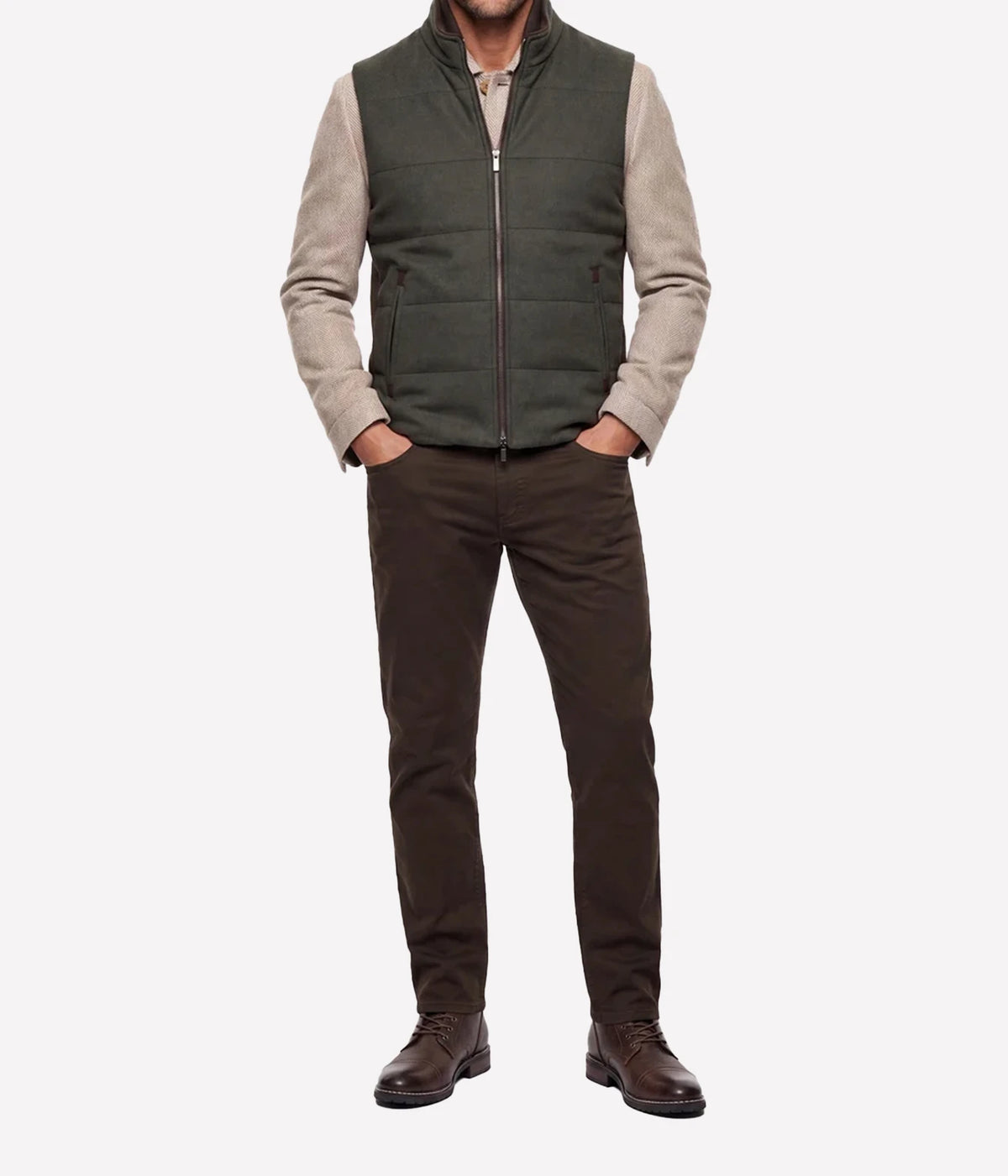 Full-length view of model wearing Maurizio Baldassari Arena Quilted Wool Vest in Dark Olive with dark brown trousers