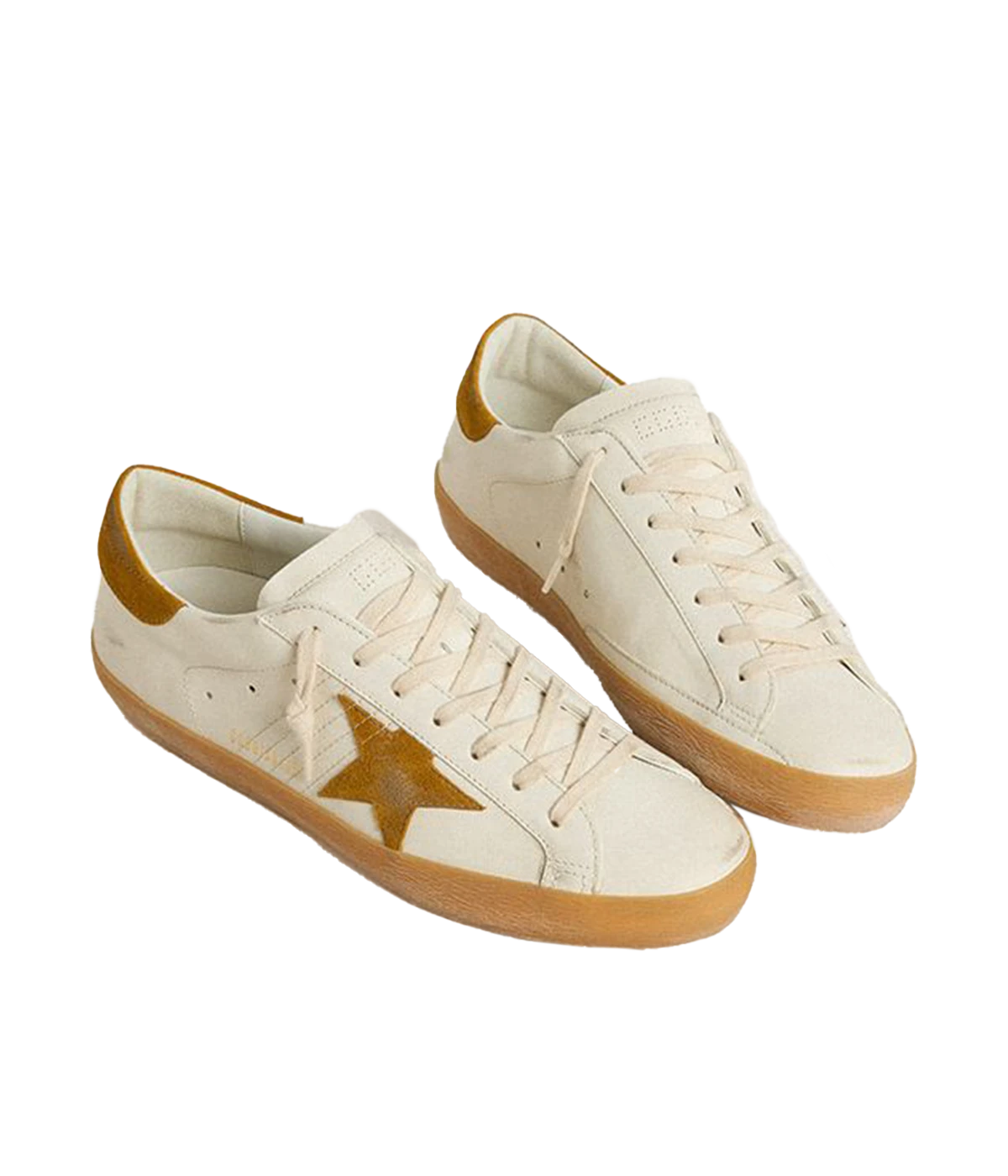Golden Goose Superstar sneakers with white leather upper, tan suede star and heel tab, and retro-inspired gum sole. Made in Italy.