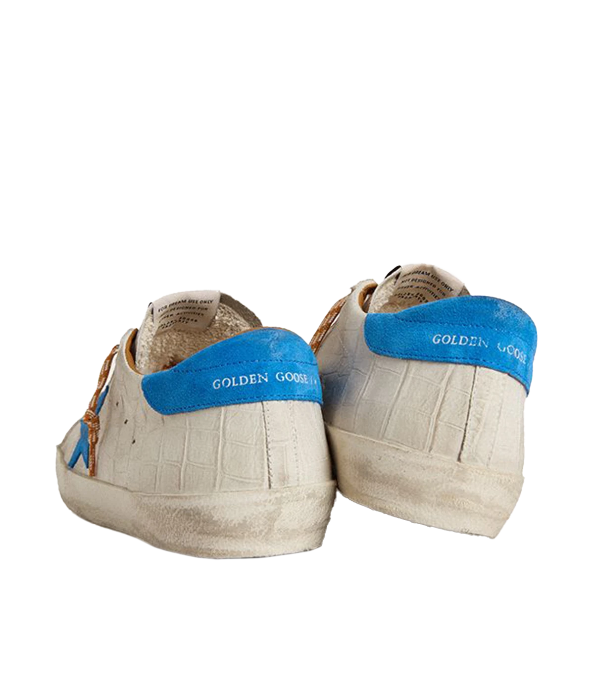 Golden Goose Superstar sneakers with white crocodile-embossed leather, blue suede star and heel tab, and distressed detailing. Made in Italy.