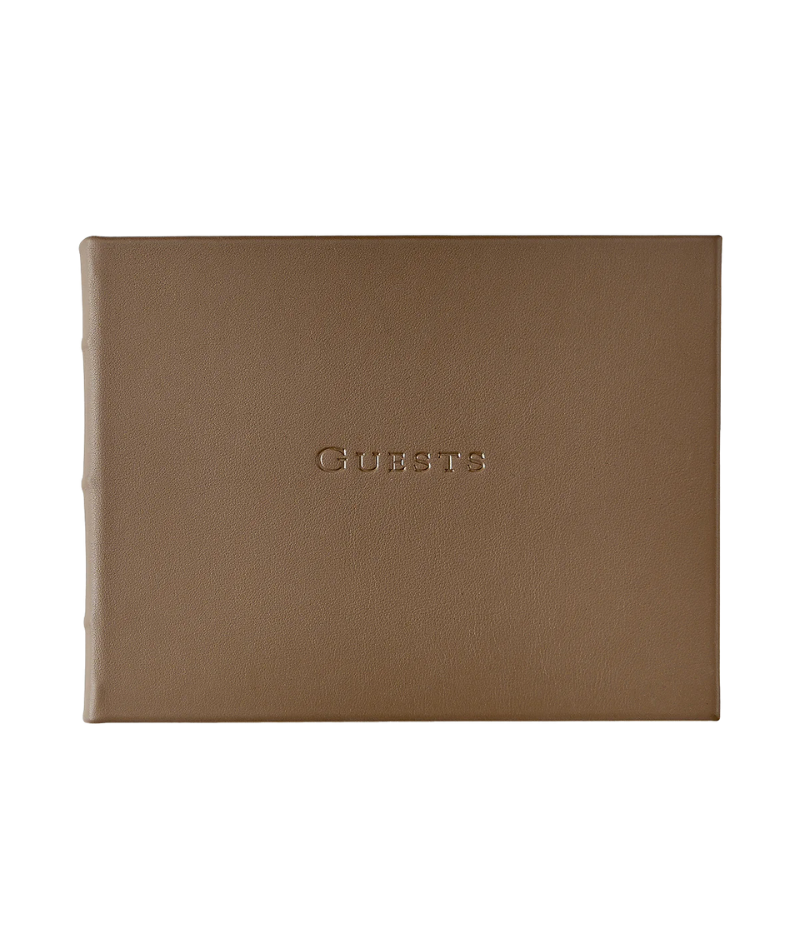Taupe leather guest book with gilt-edged, lined archival pages, designed for weddings, business events, and special occasions.