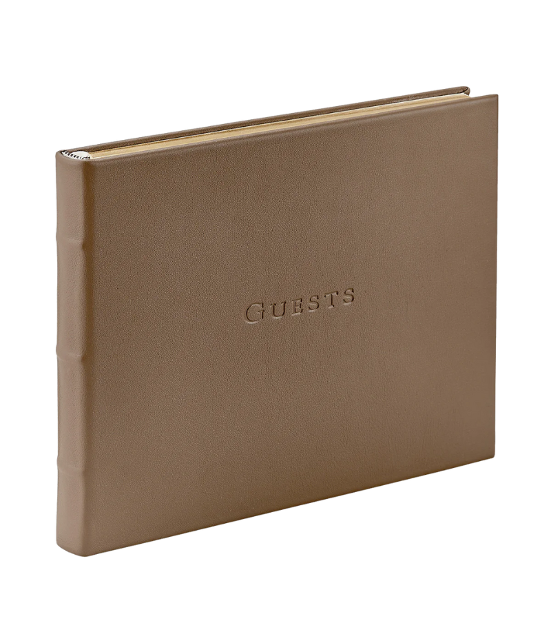 Taupe leather guest book with gilt-edged, lined archival pages, designed for weddings, business events, and special occasions.