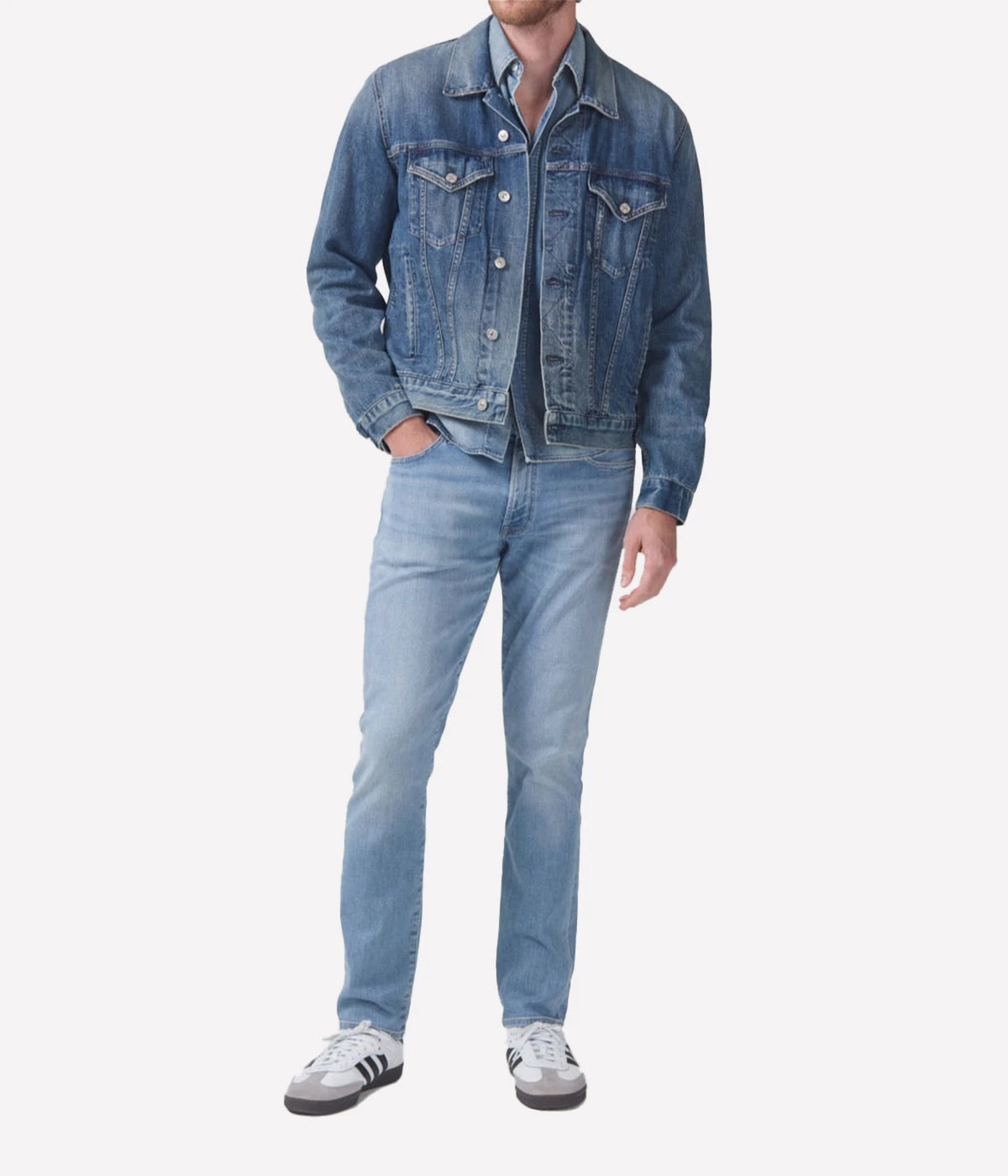 Gage jeans by Citizens of Humanity, crafted from heavyweight denim in light indigo with fading. Features a relaxed fit through the thigh, tapered ankle, zip fly closure, and a 10 1/4” rise. Made from cotton, lyocell, and elastane for structured comfort.