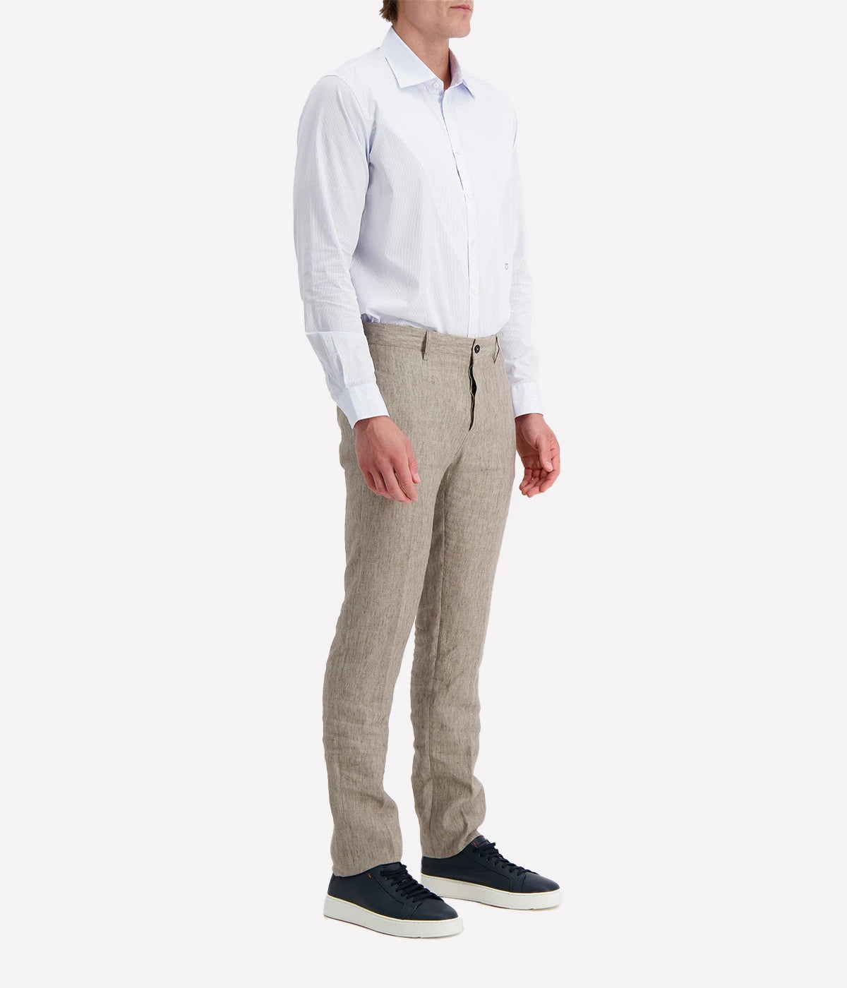 Regular-fit cotton shirt with a pointed collar, soft front placket, cotton voile inner bib, and custom badge embroidery. Made in Italy.