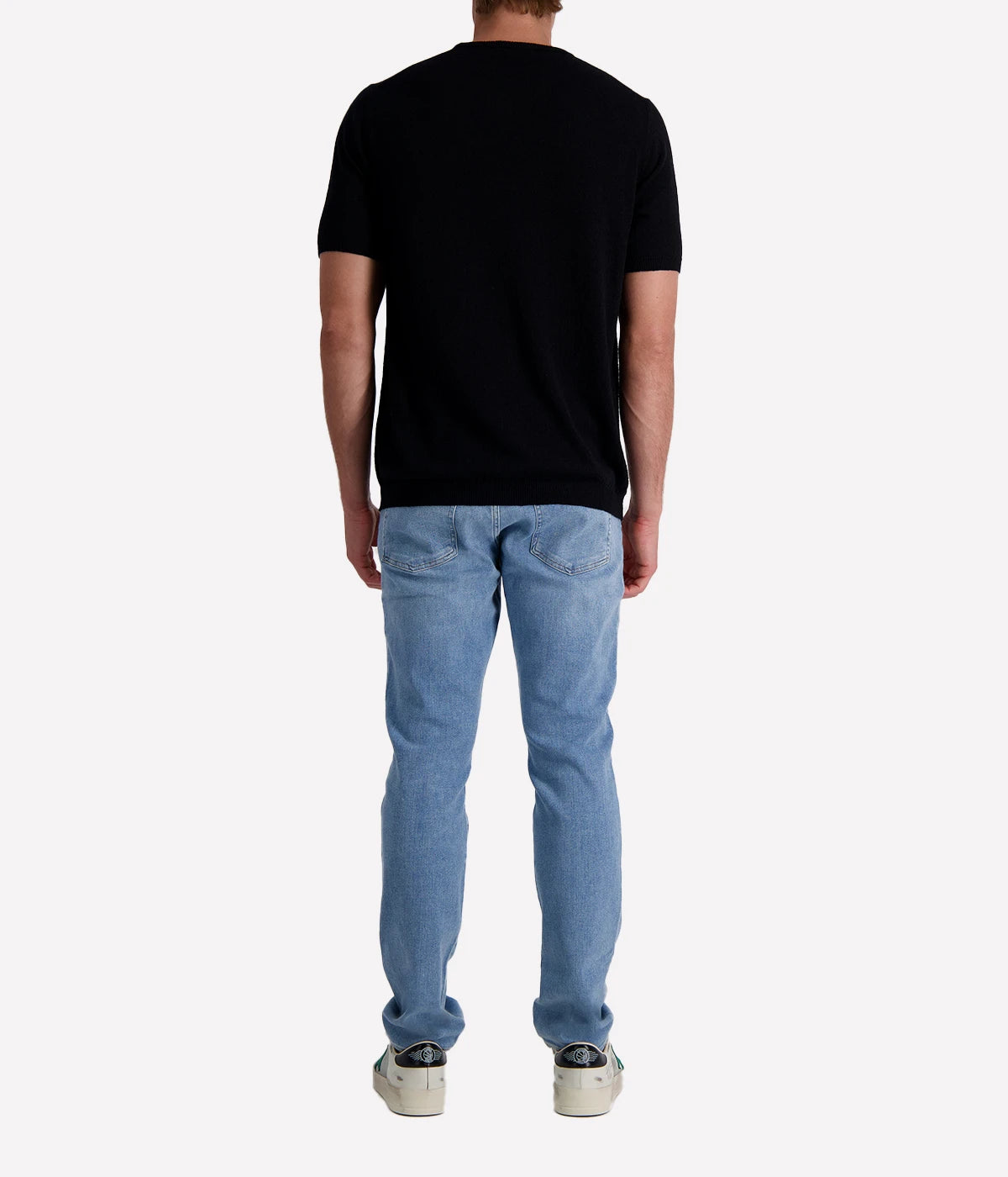 Black spongy-knit t-shirt crafted from a textured cotton blend, finished with ribbed details for a sleek and modern twist.
