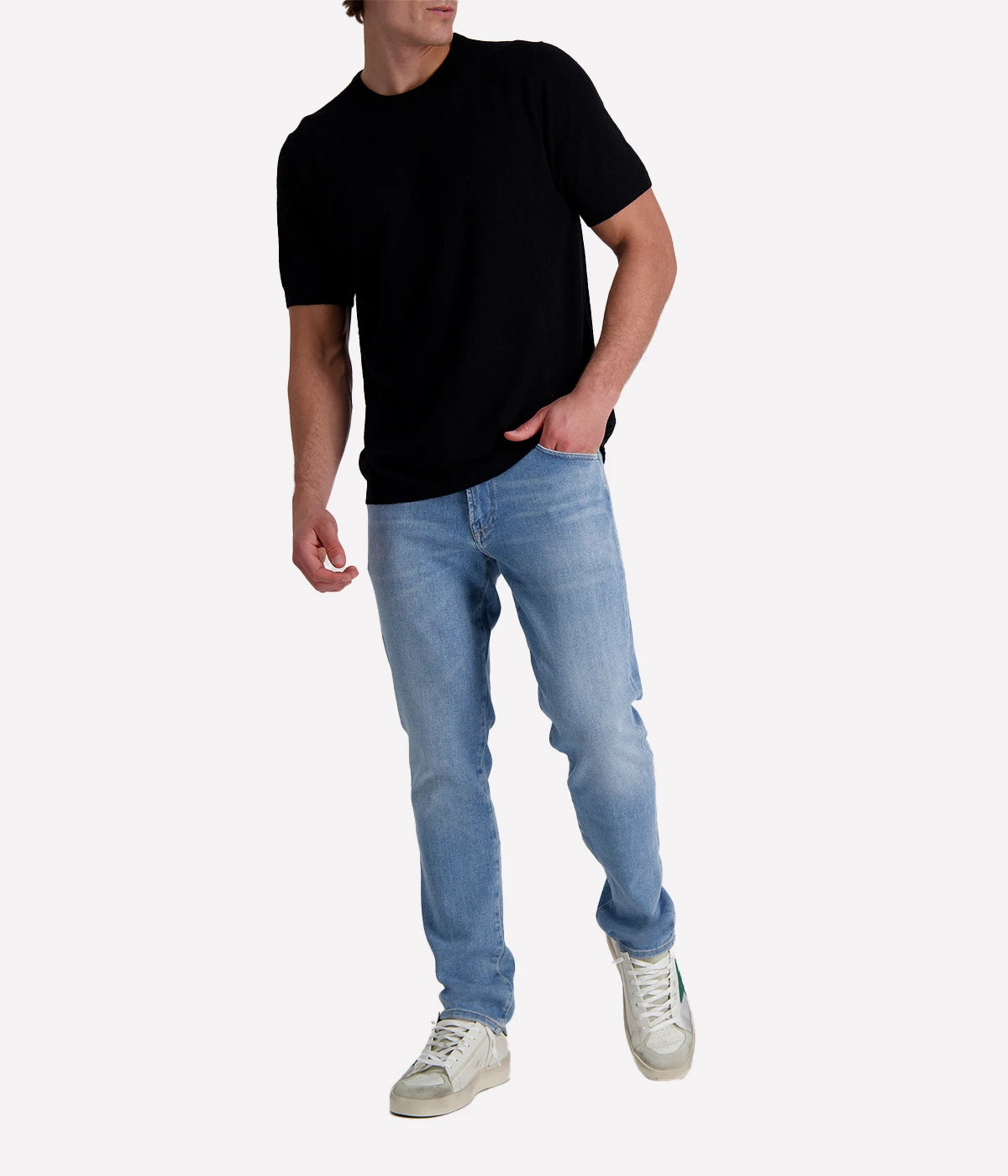 Black spongy-knit t-shirt crafted from a textured cotton blend, finished with ribbed details for a sleek and modern twist.