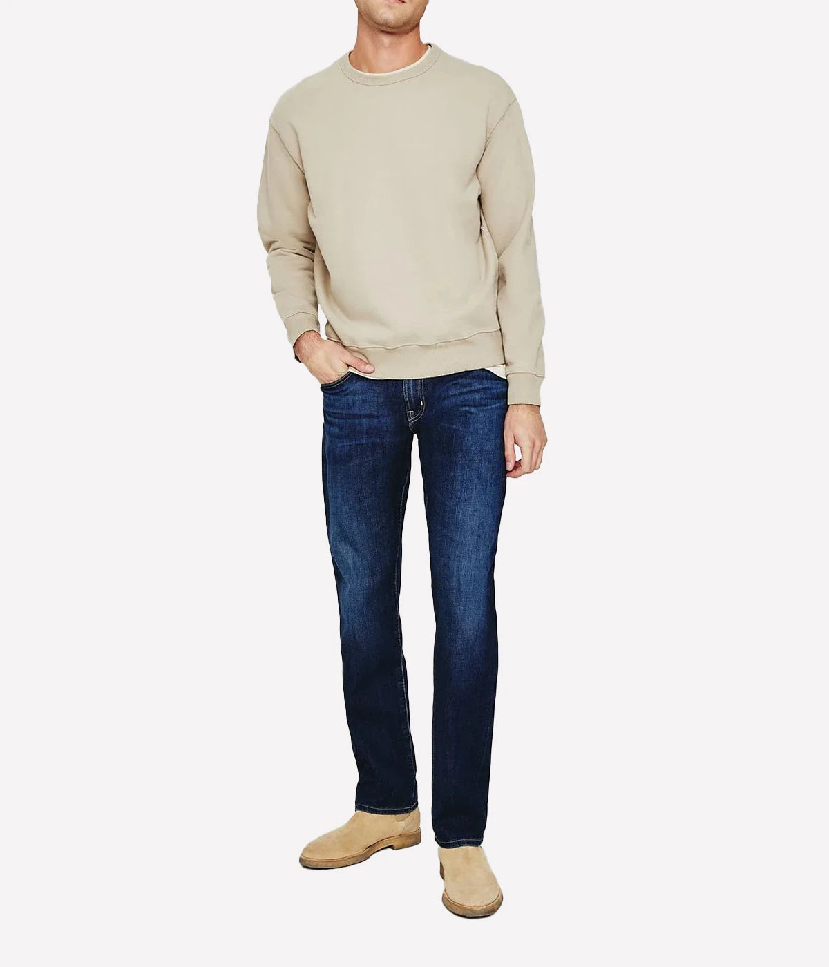 AG Graduate slim straight jeans for men in a medium-dark wash, featuring a slim mid-rise waist and relaxed fit through the hip to the knee. Tapered leg opening with Flex 360° Denim for added comfort and stretch