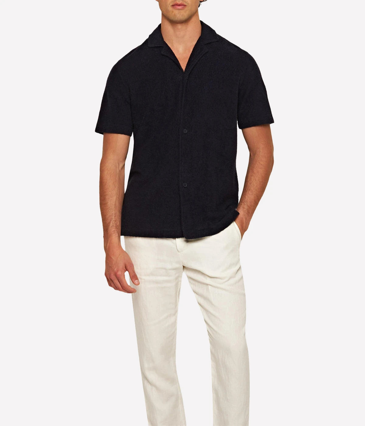 Night Iris Howell shirt from Orlebar Brown, crafted from double-faced towelling pique. Features a relaxed fit, Capri collar, 3-button opening, and branded nylon buttons. A versatile and stylish shirt perfect for summer and travel.