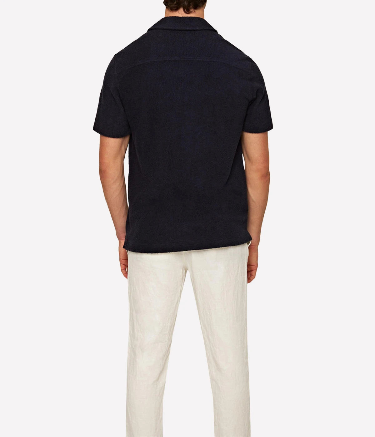 Night Iris Howell shirt from Orlebar Brown, crafted from double-faced towelling pique. Features a relaxed fit, Capri collar, 3-button opening, and branded nylon buttons. A versatile and stylish shirt perfect for summer and travel.