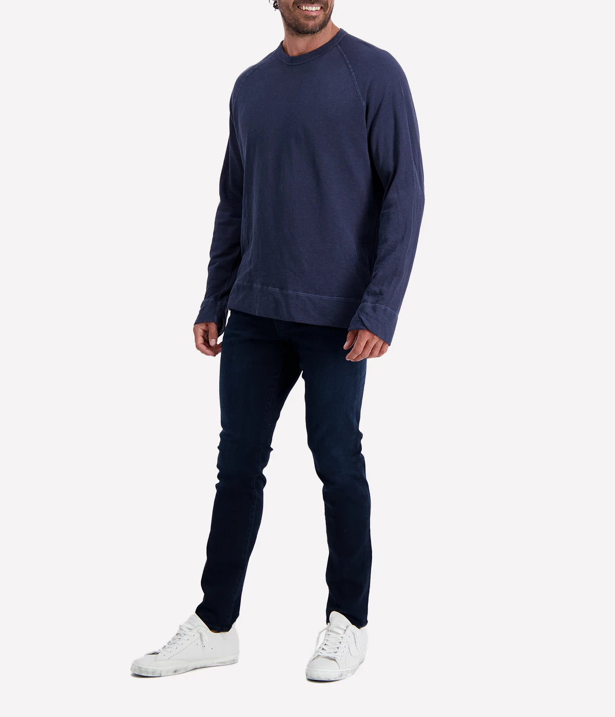 Close-up of James Perse Vintage French Terry Sweatshirt in navy blue, showing soft cotton texture, crew neckline, raglan sleeves, and relaxed fit.