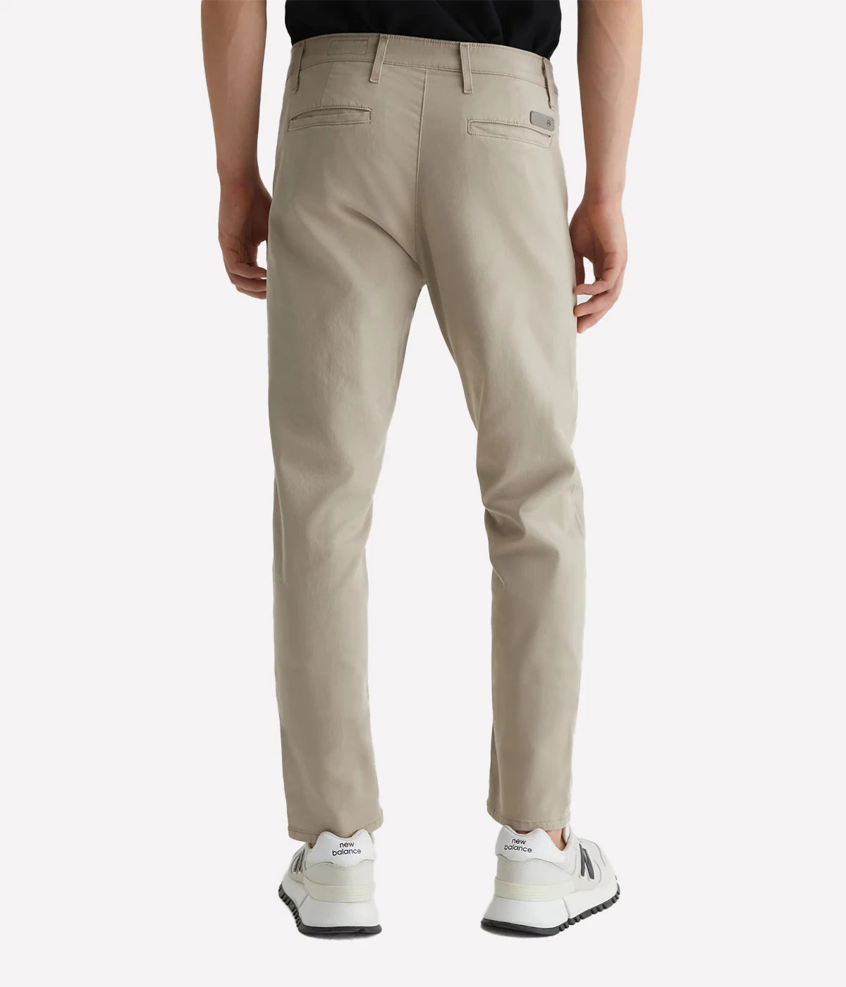 The back view of the Jamison Skinny Trouser in khaki highlights the welt pockets and tailored design. Crafted from Sorrento Stretch Twill, these trousers offer a refined, skinny fit that’s both stylish and comfortable for everyday wear.