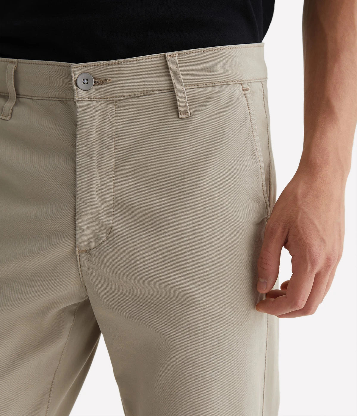 A close-up view of the Jamison Skinny Trouser in khaki, highlighting the fine detailing of the Sorrento Stretch Twill fabric. The smooth texture, slim stitching, and welt pocket design emphasize the trousers’ tailored, refined look, offering both style and comfort.