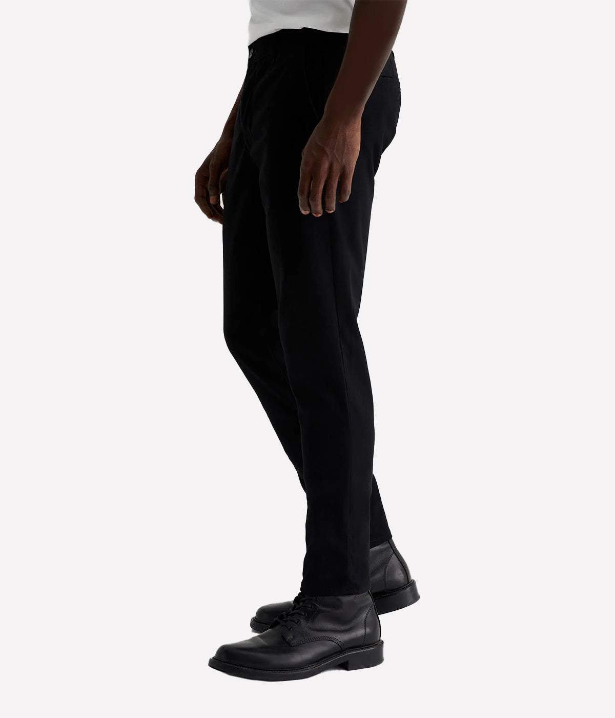 A side profile of the Jamison Skinny Trouser in black, emphasizing the tailored fit and tapered leg. The soft, sueded texture of the Brushed Moleskin fabric is visible, giving the trousers a sophisticated, versatile appearance. The slim cut offers a contemporary look, perfect for modern wardrobes.