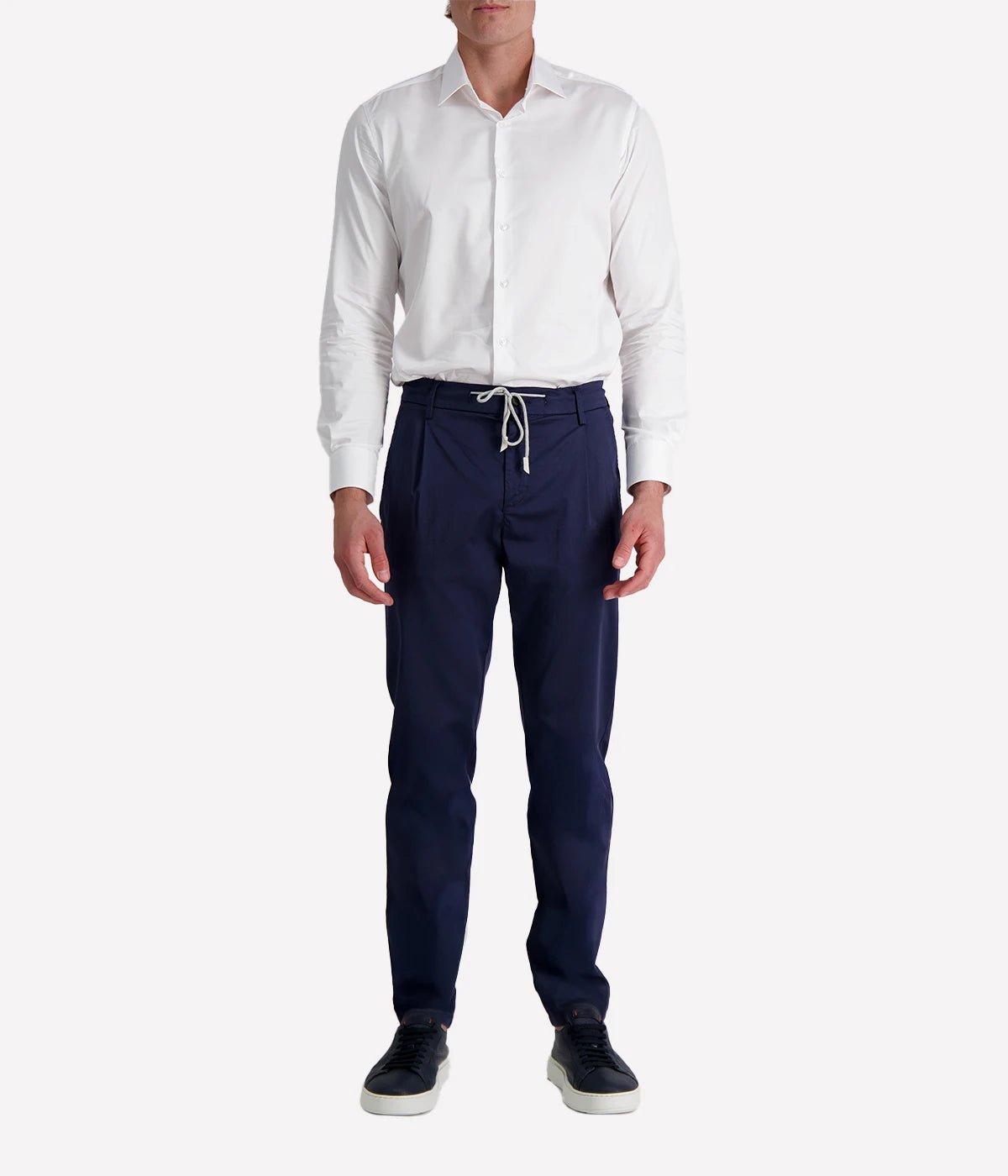 Eleventy tailored drawstring pants in navy jersey-effect cotton with subtle seam fading and sartorial detailing, made in Italy.