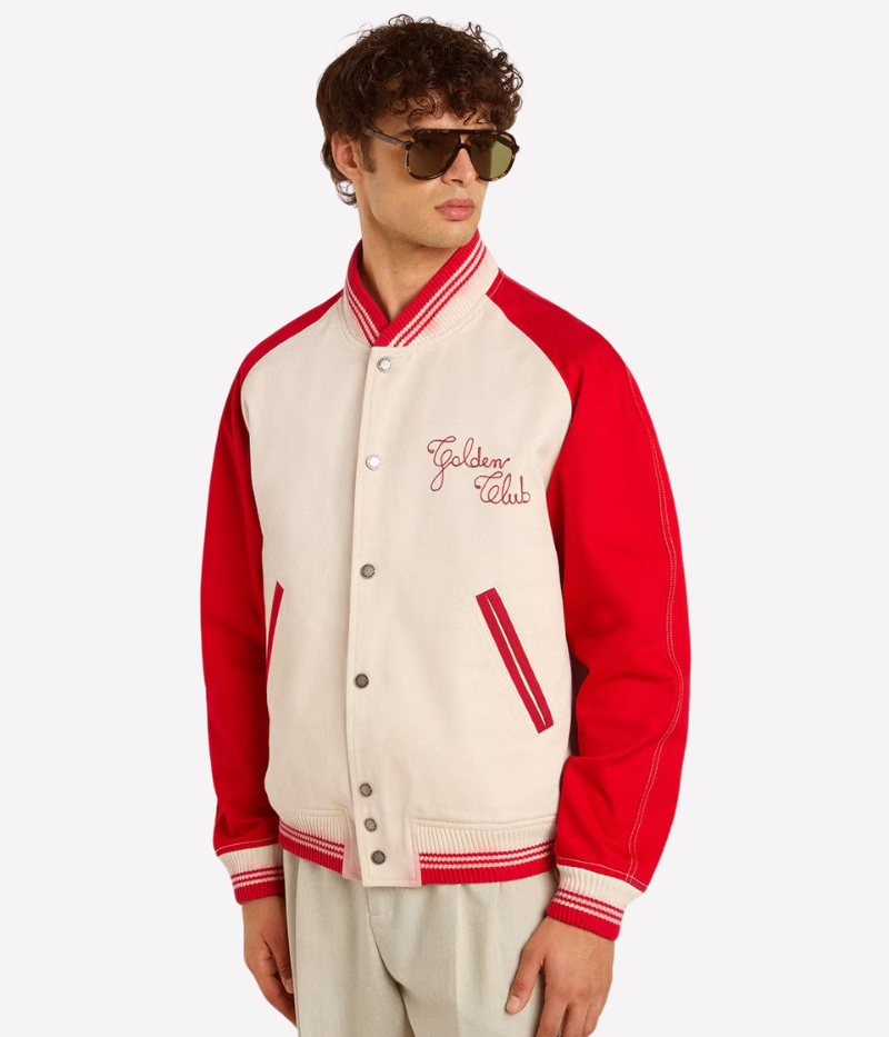 Golden Goose bomber jacket in worn white and red cotton with ‘Golden Club’ chest embroidery, faded striped ribbed trims, and double star on the back.