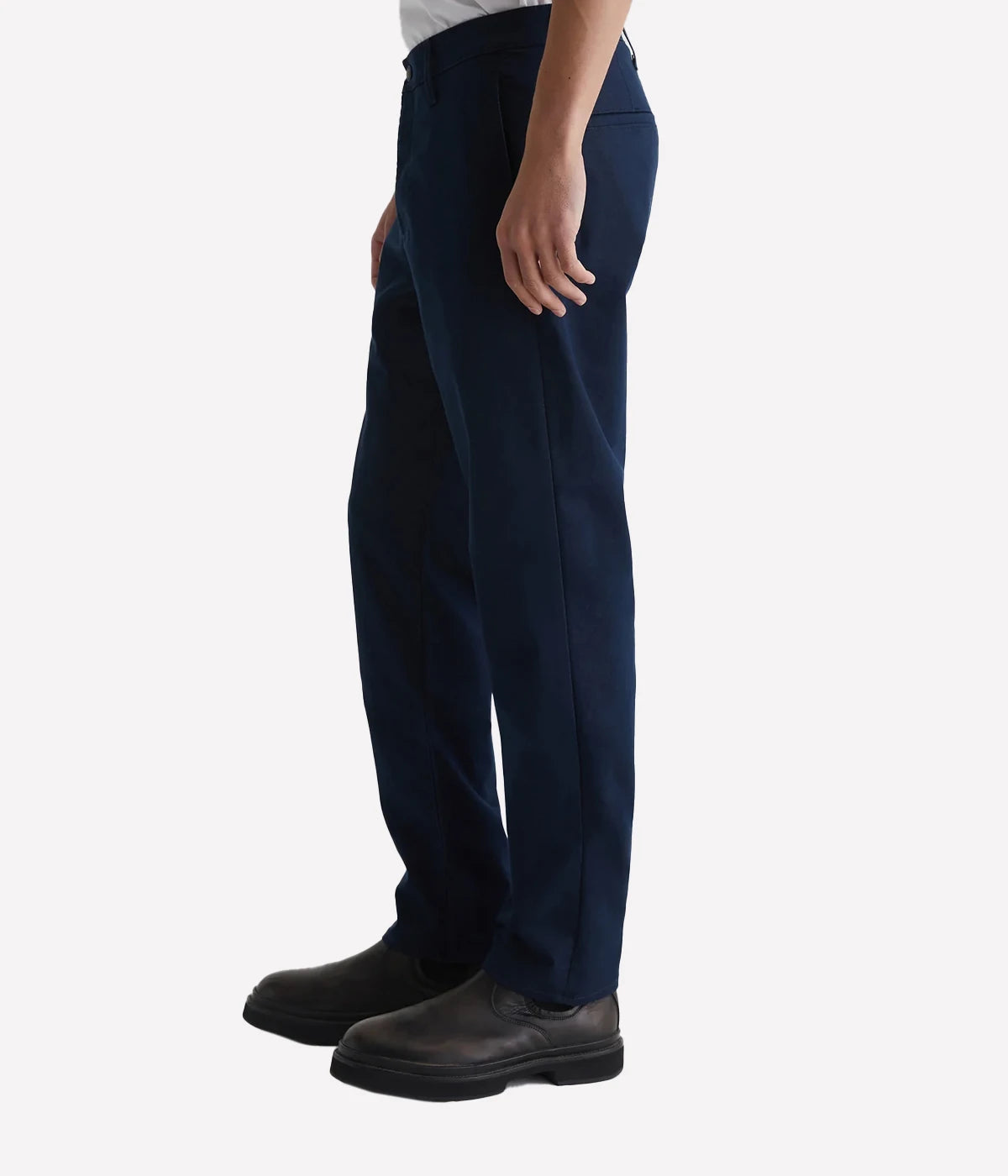 Men’s dark blue performance trousers with slim fit, on-seam front pockets, and welt back pockets.