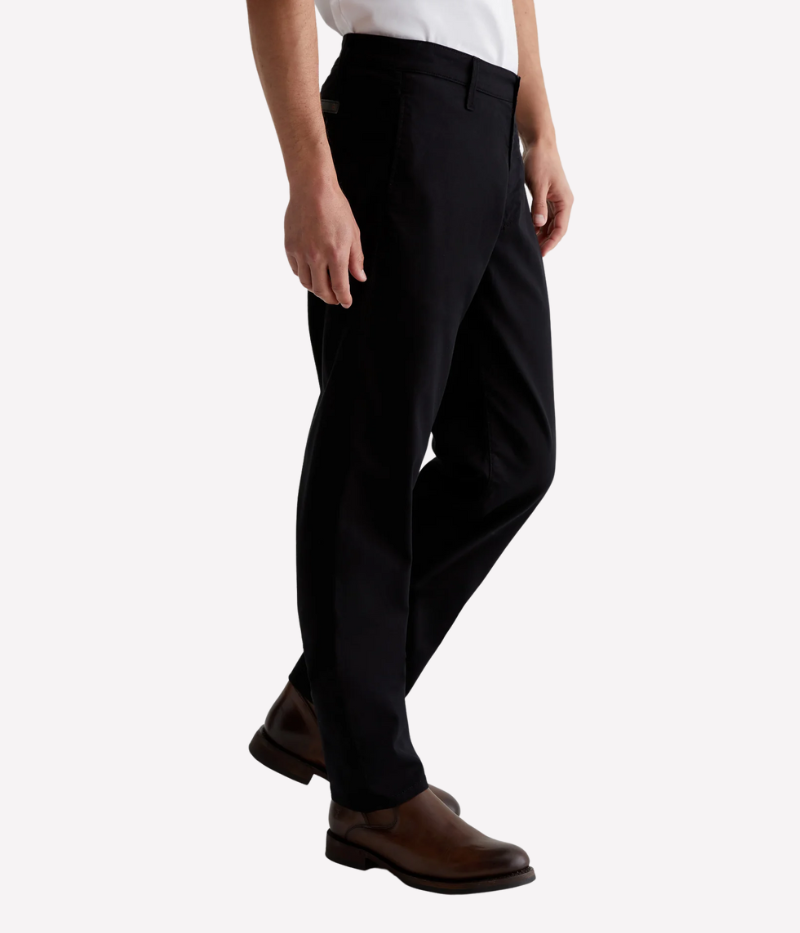 A versatile slim-fit trouser designed for modern men who appreciate style and comfort. Crafted from premium Sorrento Stretch Twill, these black trousers offer a tailored look with flexibility, making them perfect for both casual and elevated occasions.